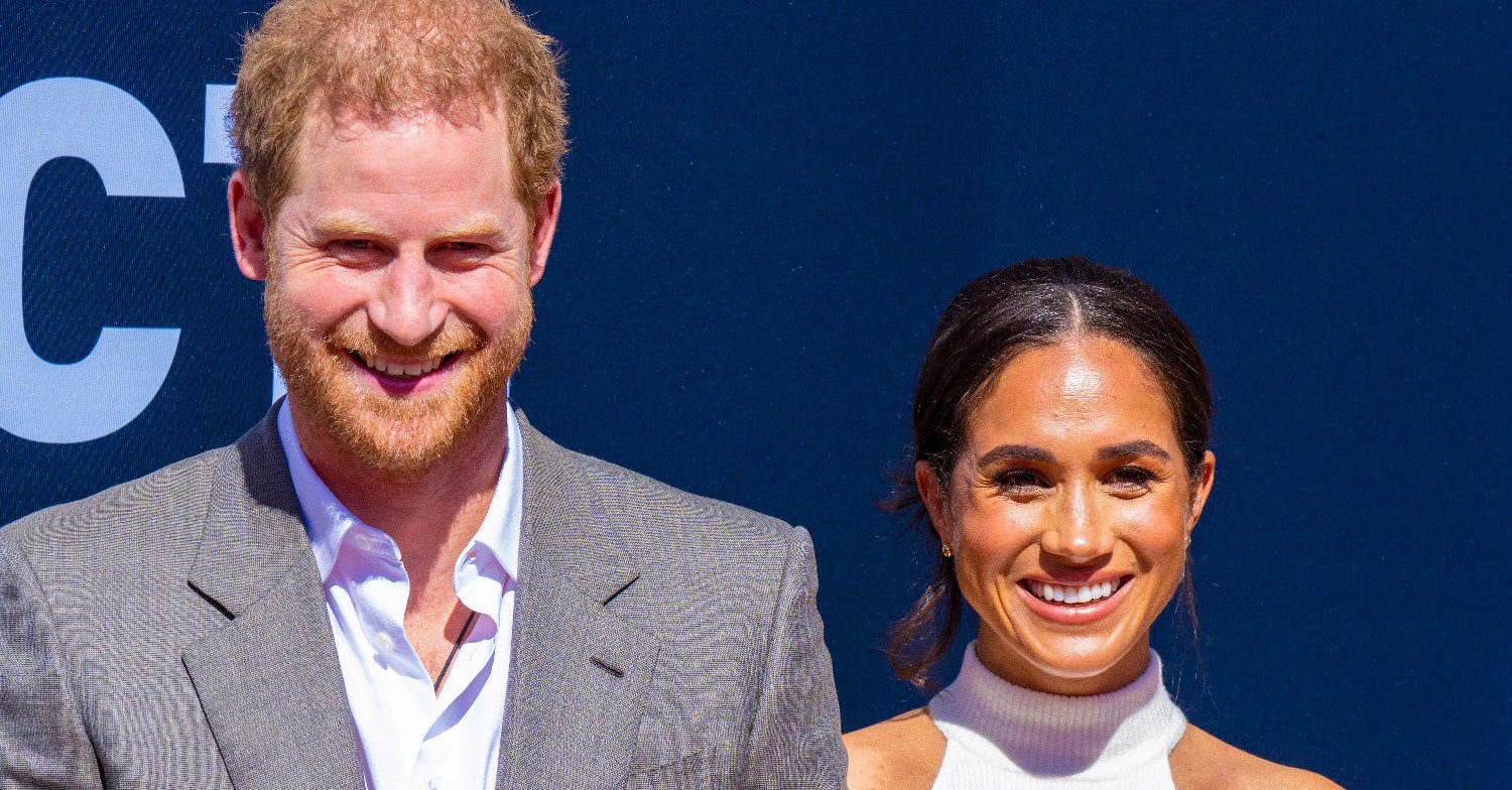 Harry and Meghan smile 