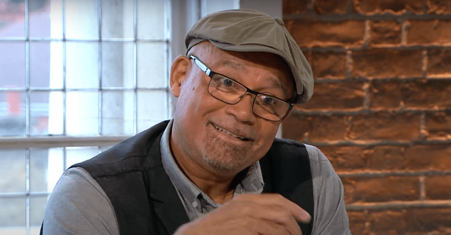 Louis Emerick wearing a hat