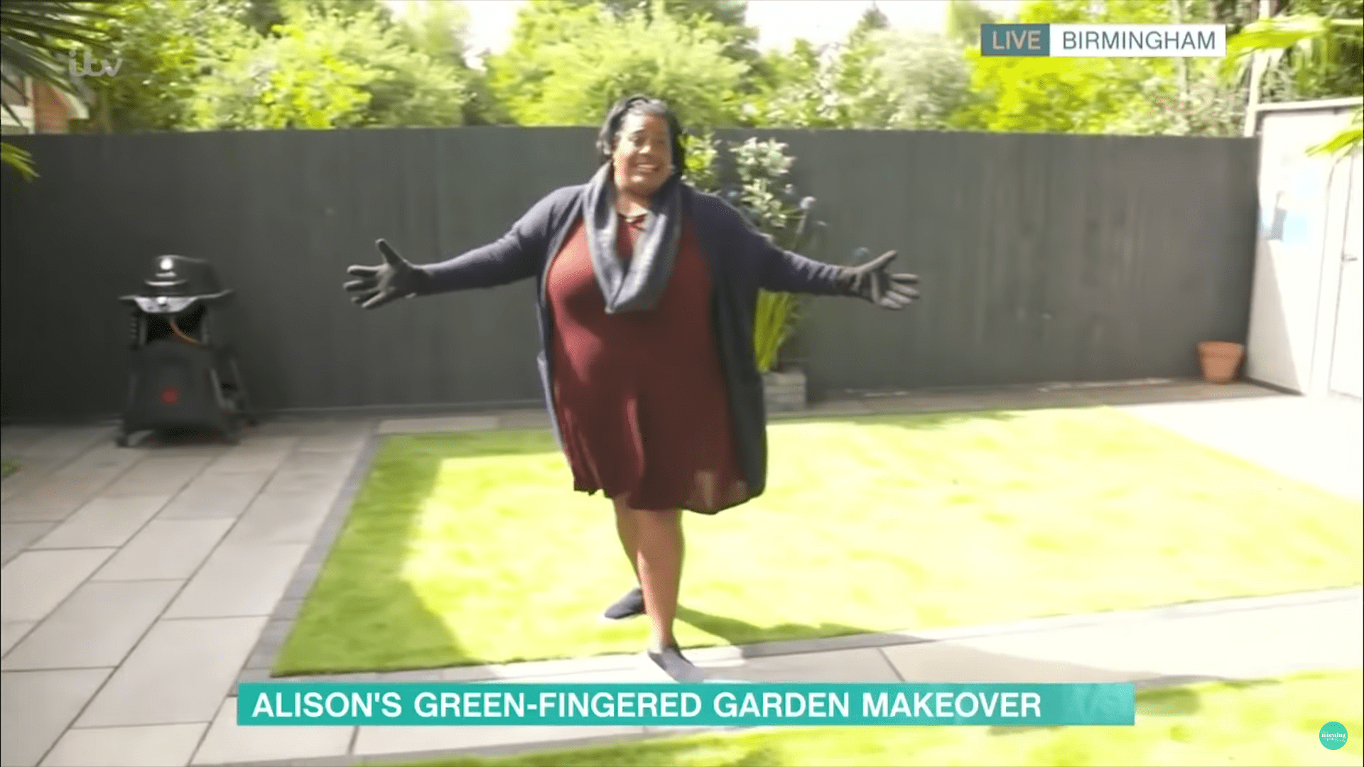 Alison Hammond poses outside in her garden