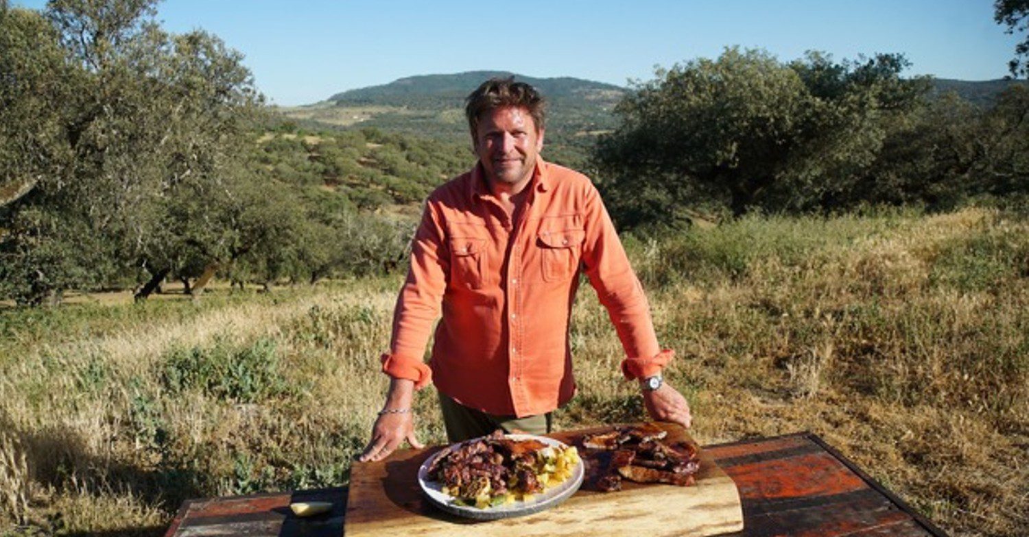 Chef James Martin posing with food