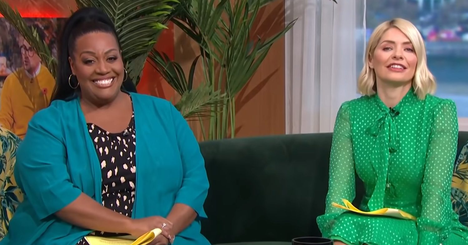 Alison Hammond smiles with Holly Willoughby on This Morning