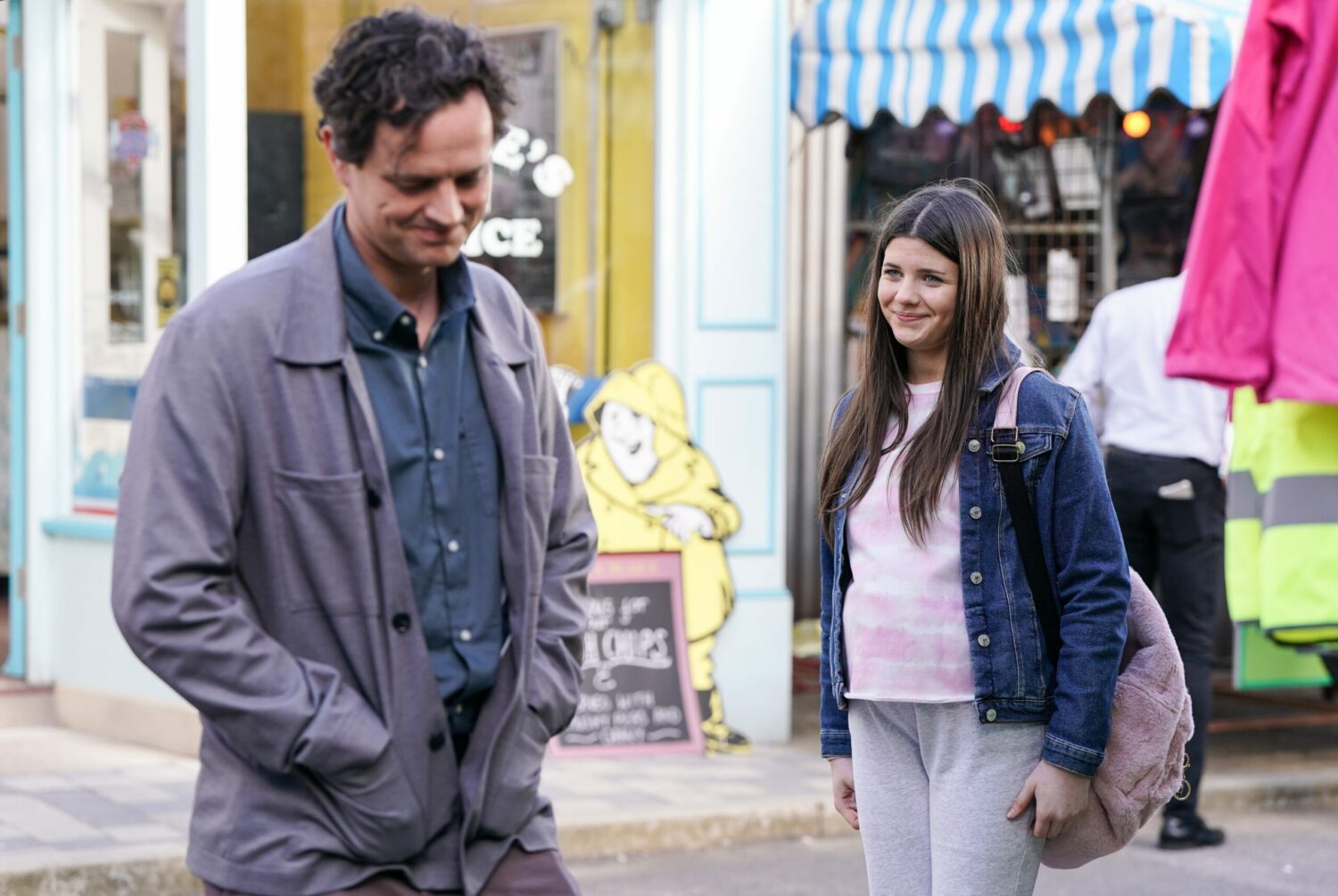 EastEnders' Theo and Lily are smiling outside