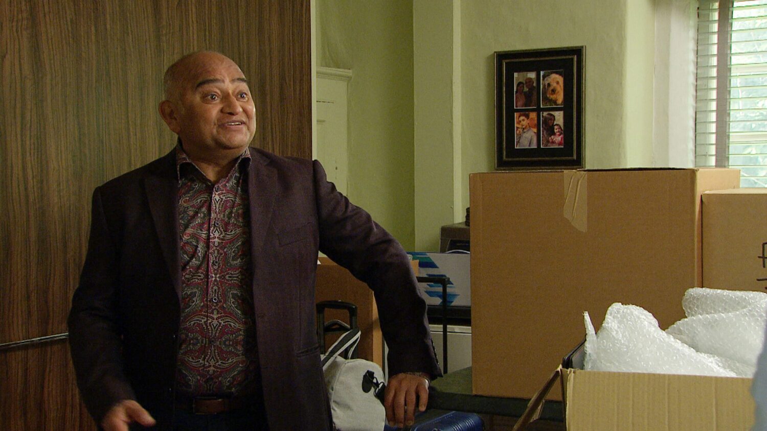 Rishi looking happy on Emmerdale