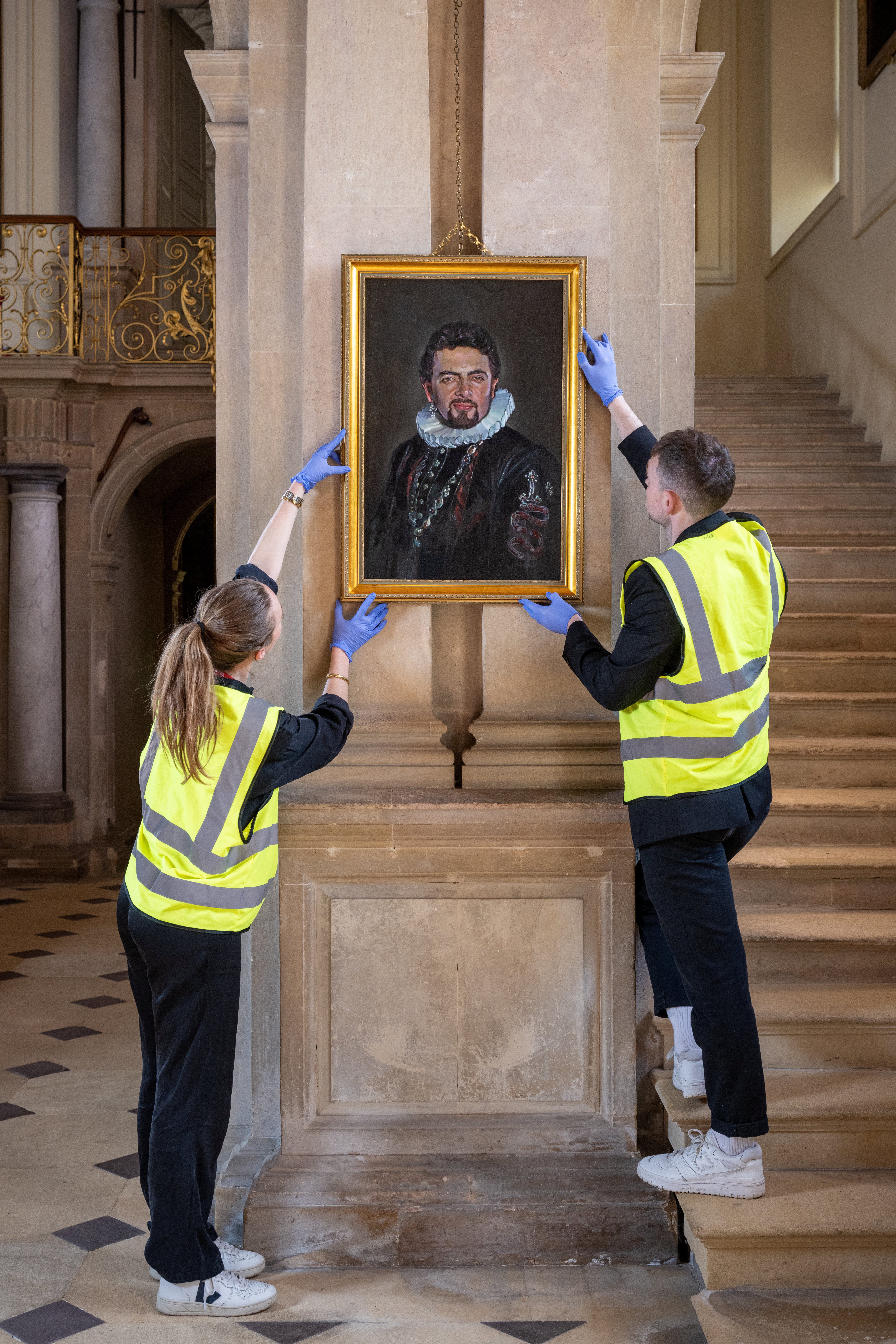 Blackadder painting being hung