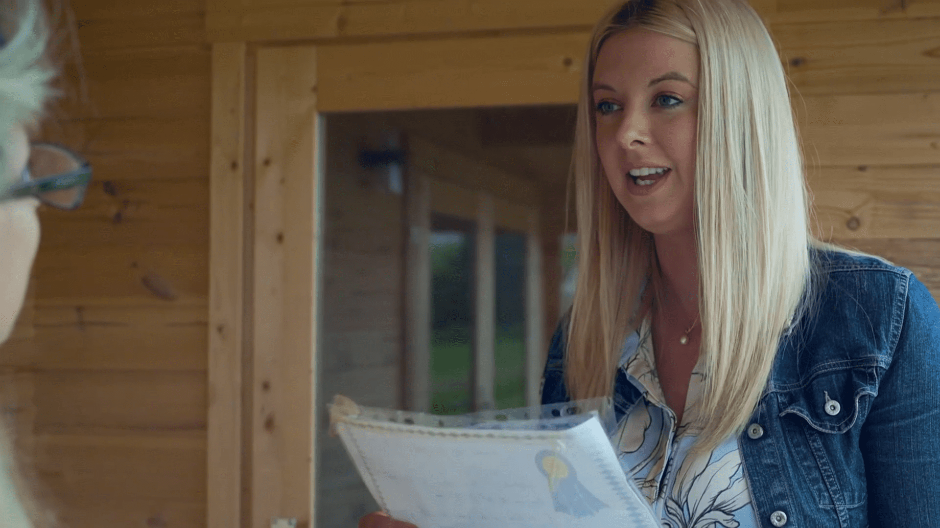 Emily Victoria smiles in Surviving Dad