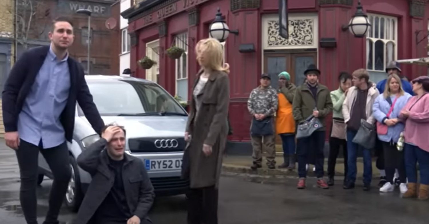 EastEnders' Ben is on the floor upset being supported by Callum and Kathy