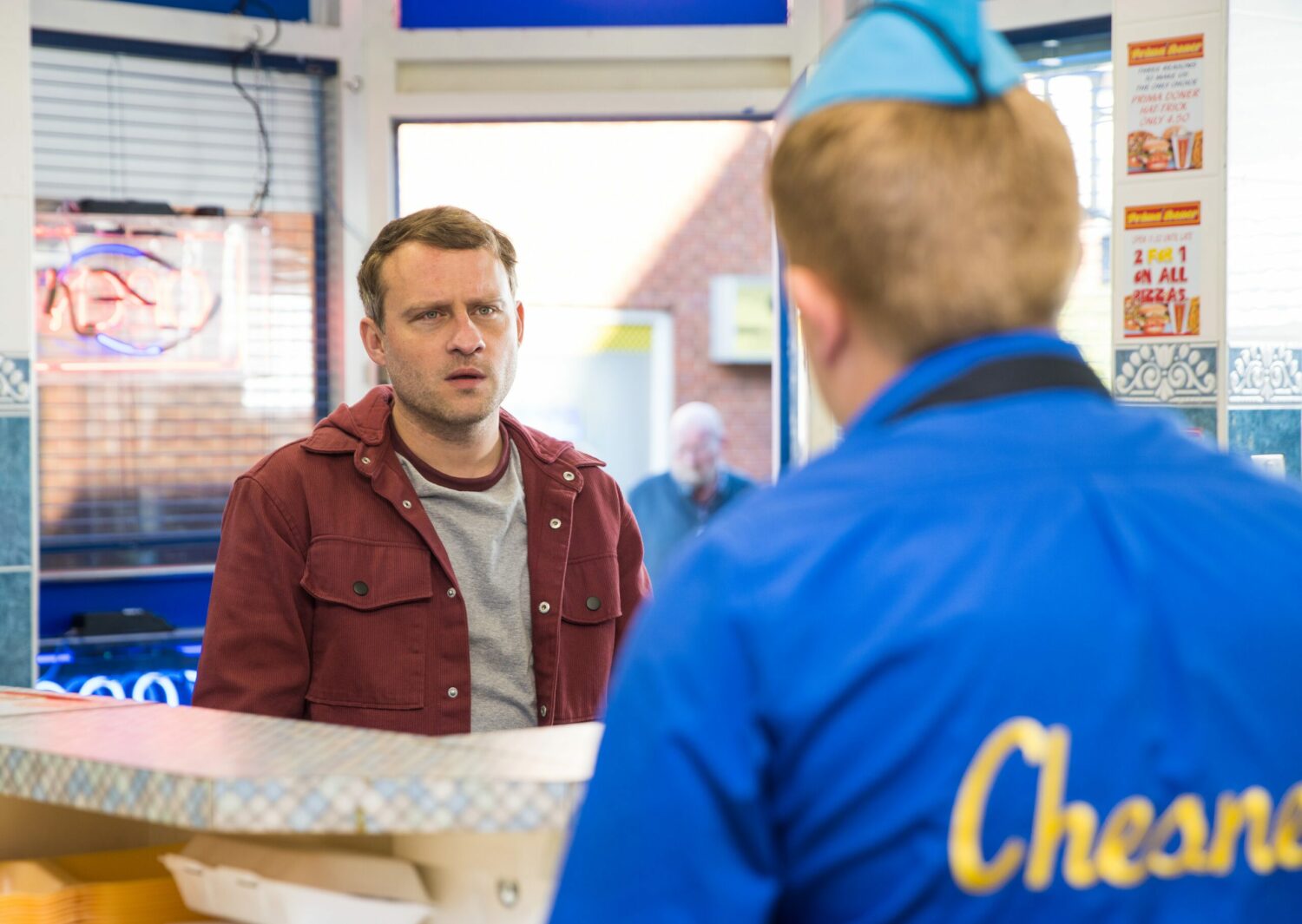 Paul Foreman looks confused as he talks to Chesney Brown in the kebab shop