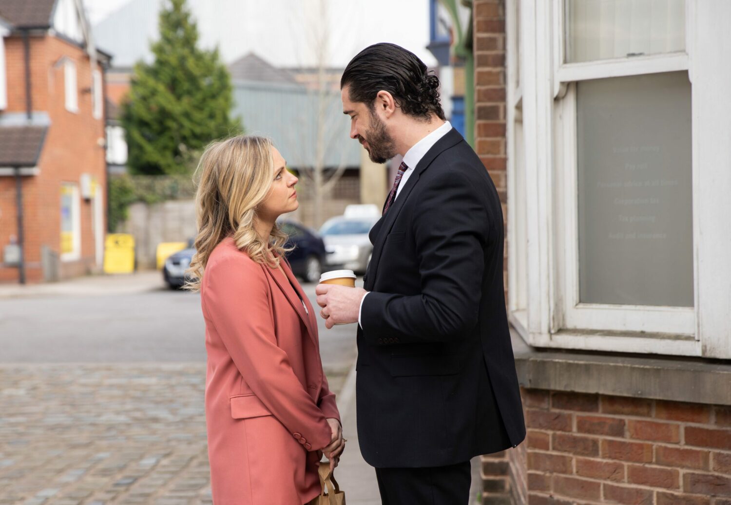 Coronation Street's Sarah and Adam are staring into each other's eyes outside