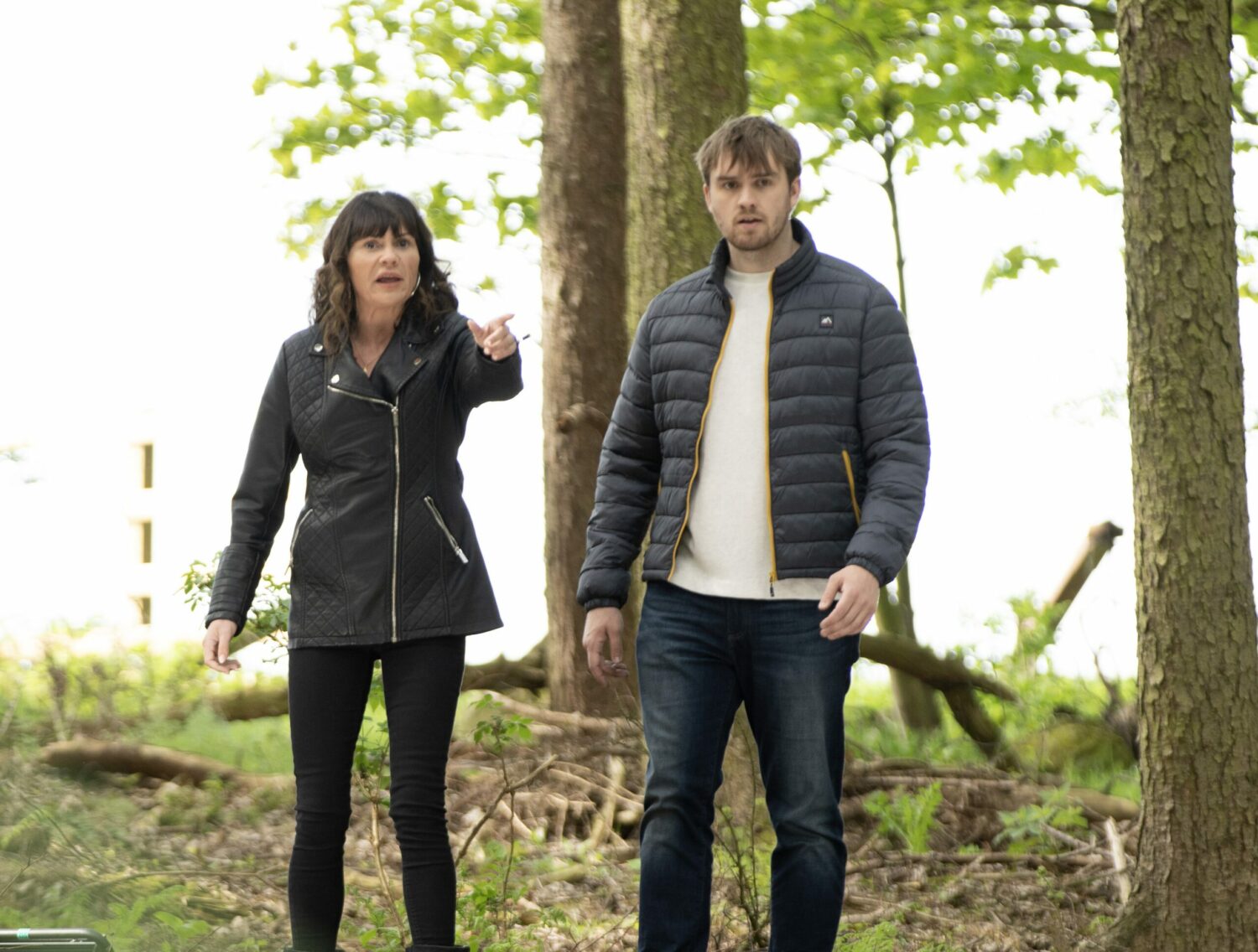 Worried Chas and Tom point out Belle in the woods in Emmerdale