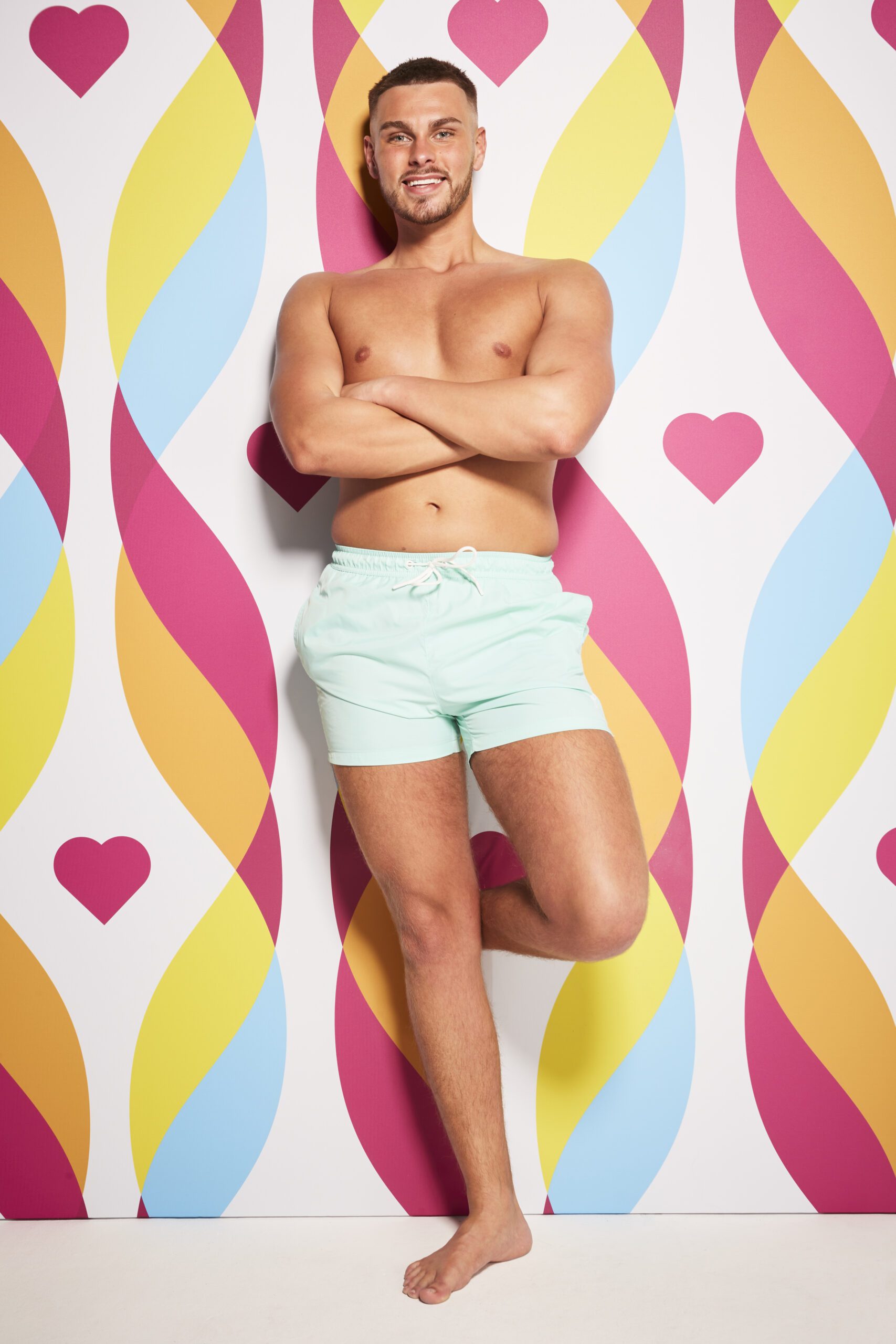 George poses on Love Island 