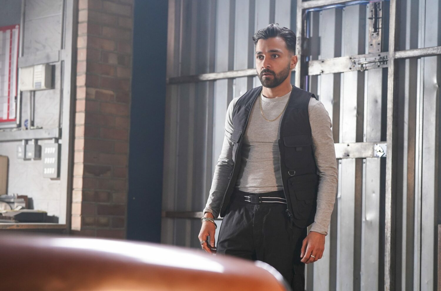 Vinny Panesar looks anxious as he breaks into Taylor's Autos