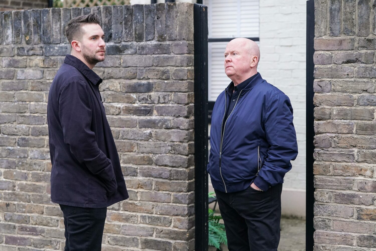 EastEnders' Callum and Phil are talking outside