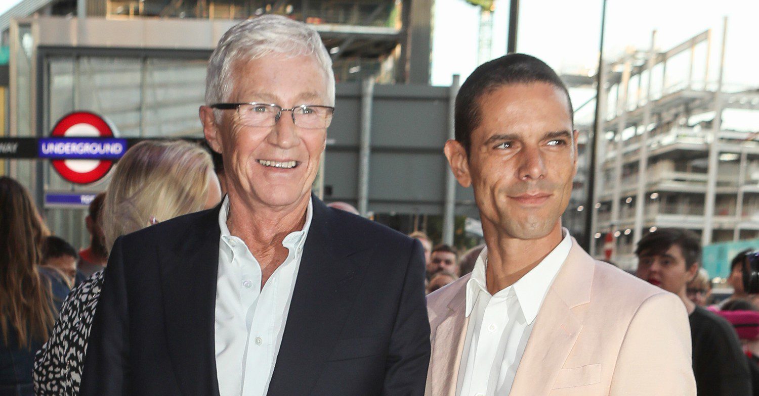 Paul O'Grady smiles with husband Andre