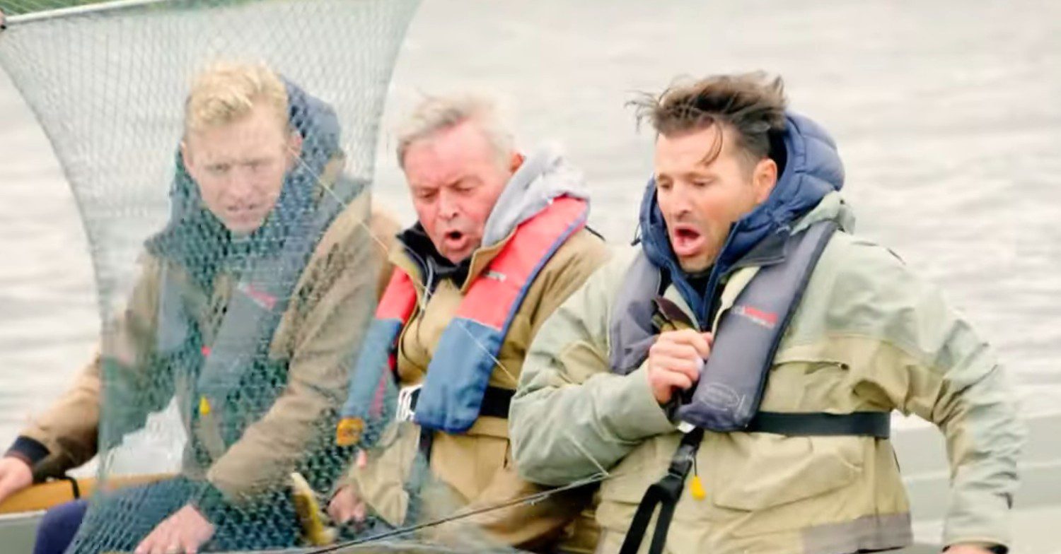 Mark Wright, brother and dad in a boat