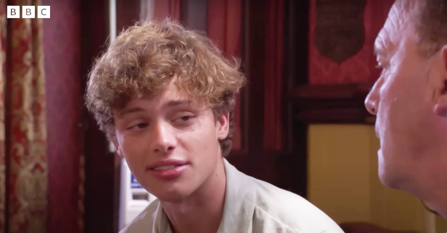 Bobby Brazier smiles as Freddie Slater in EastEnders