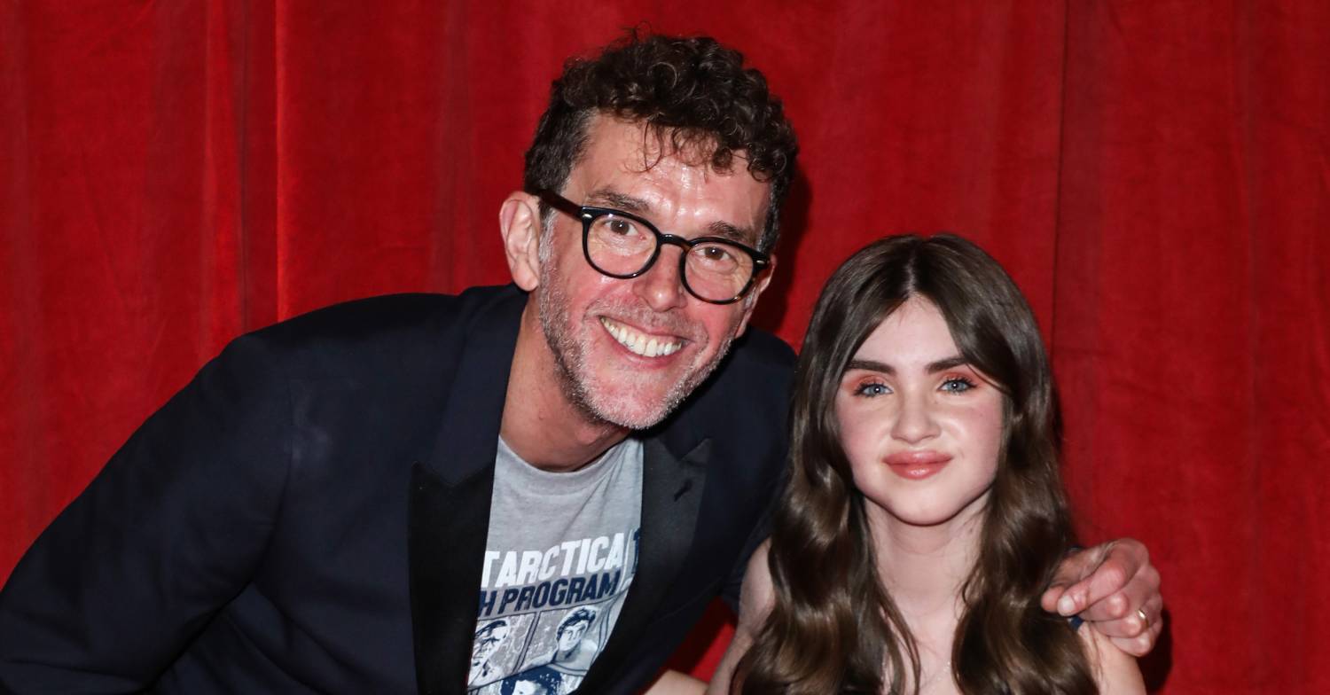 Emmerdale actress Amelia Flanagan smiles for the cameras alongside co-star Mark Charnock