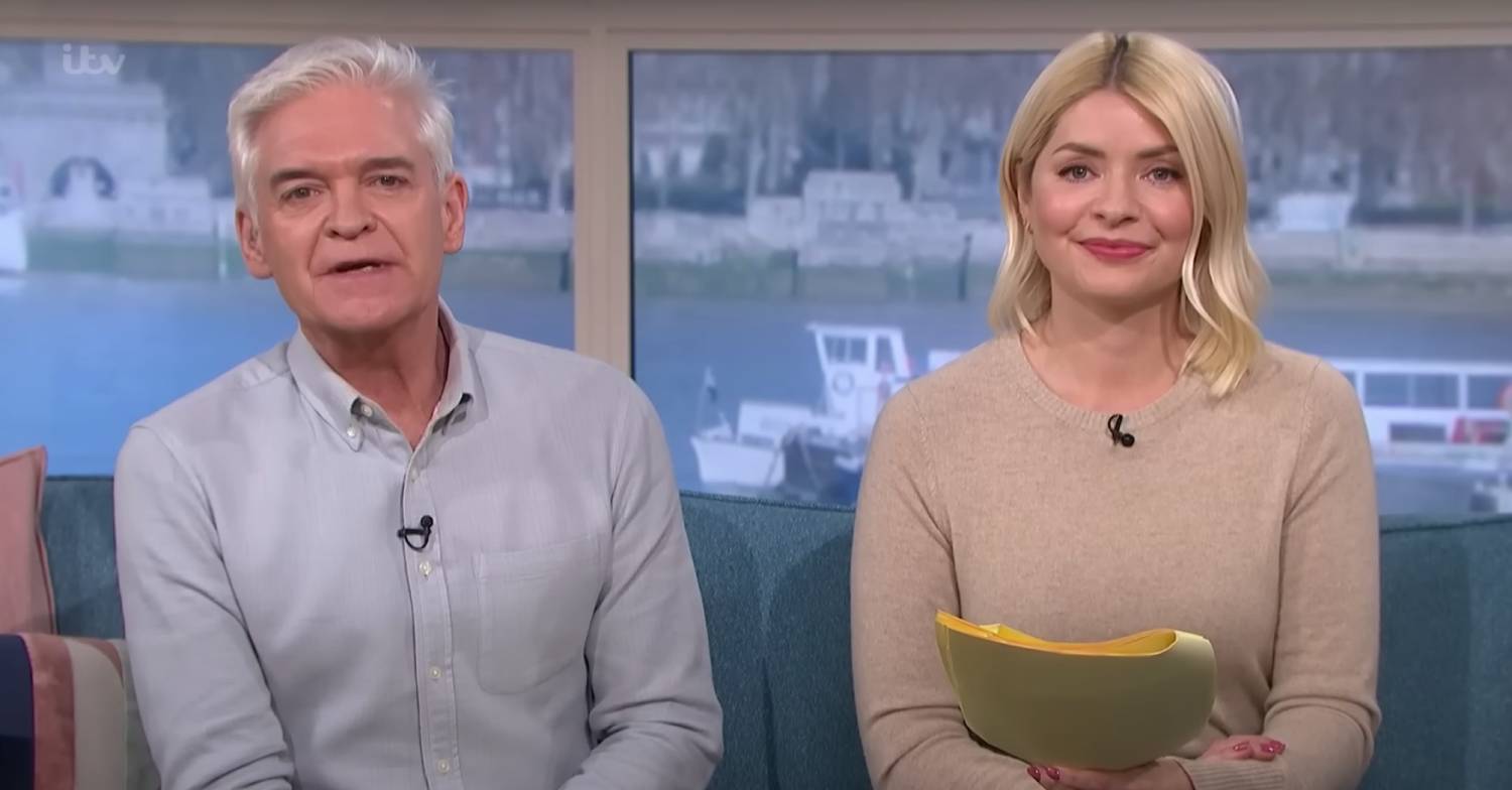 Phillip Schofield sits next to Holly Willoughby on This Morning