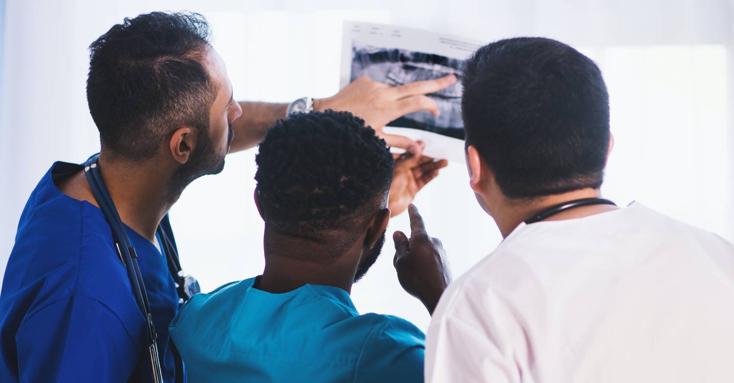 Doctors inspect an x-ray