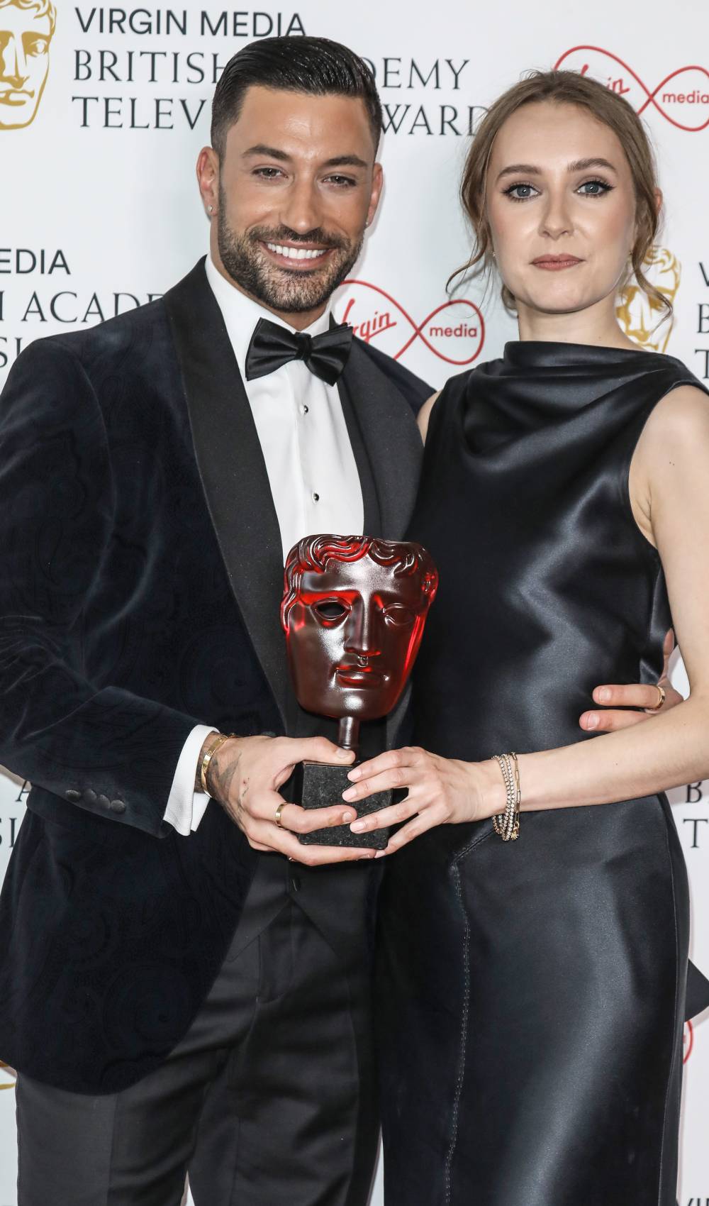 Strictly Come Dancing 2021 winner Giovanni Pernice and Rose Ayling-Ellis hold their BAFTA
