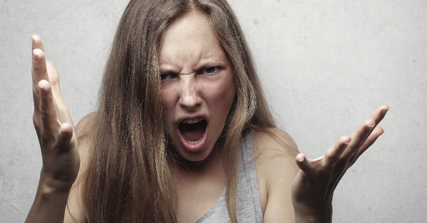 Angry woman screaming