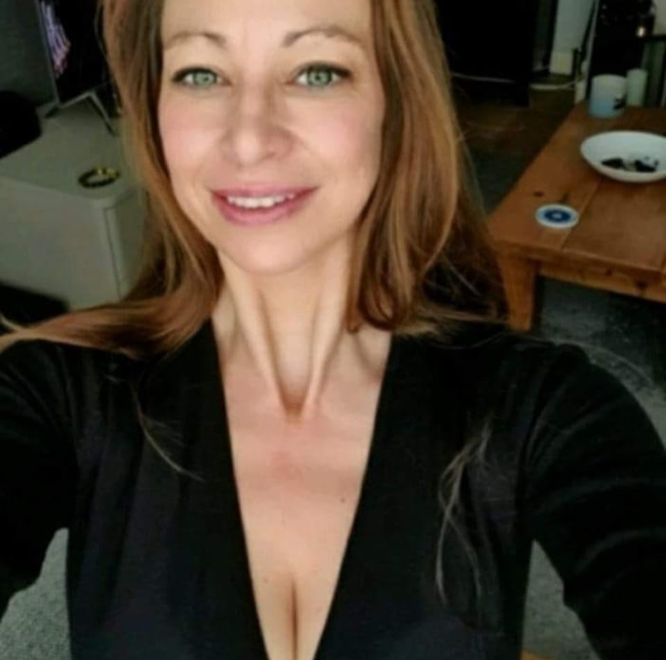 Carla Foster smiling in her Facebook profile picture