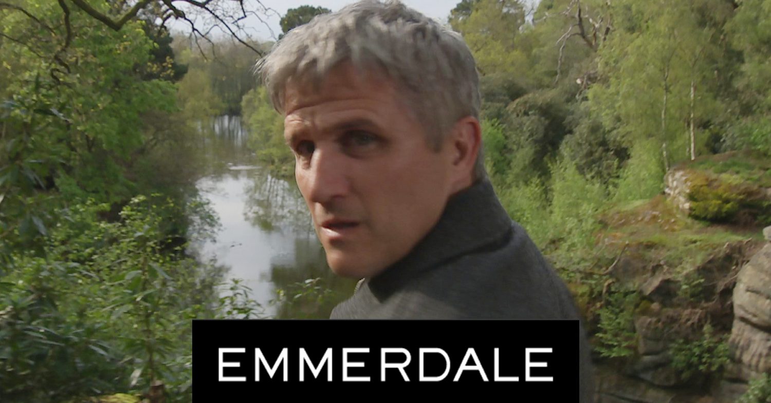 Emmerdale's Caleb is in the woodland, the Emmerdale logo