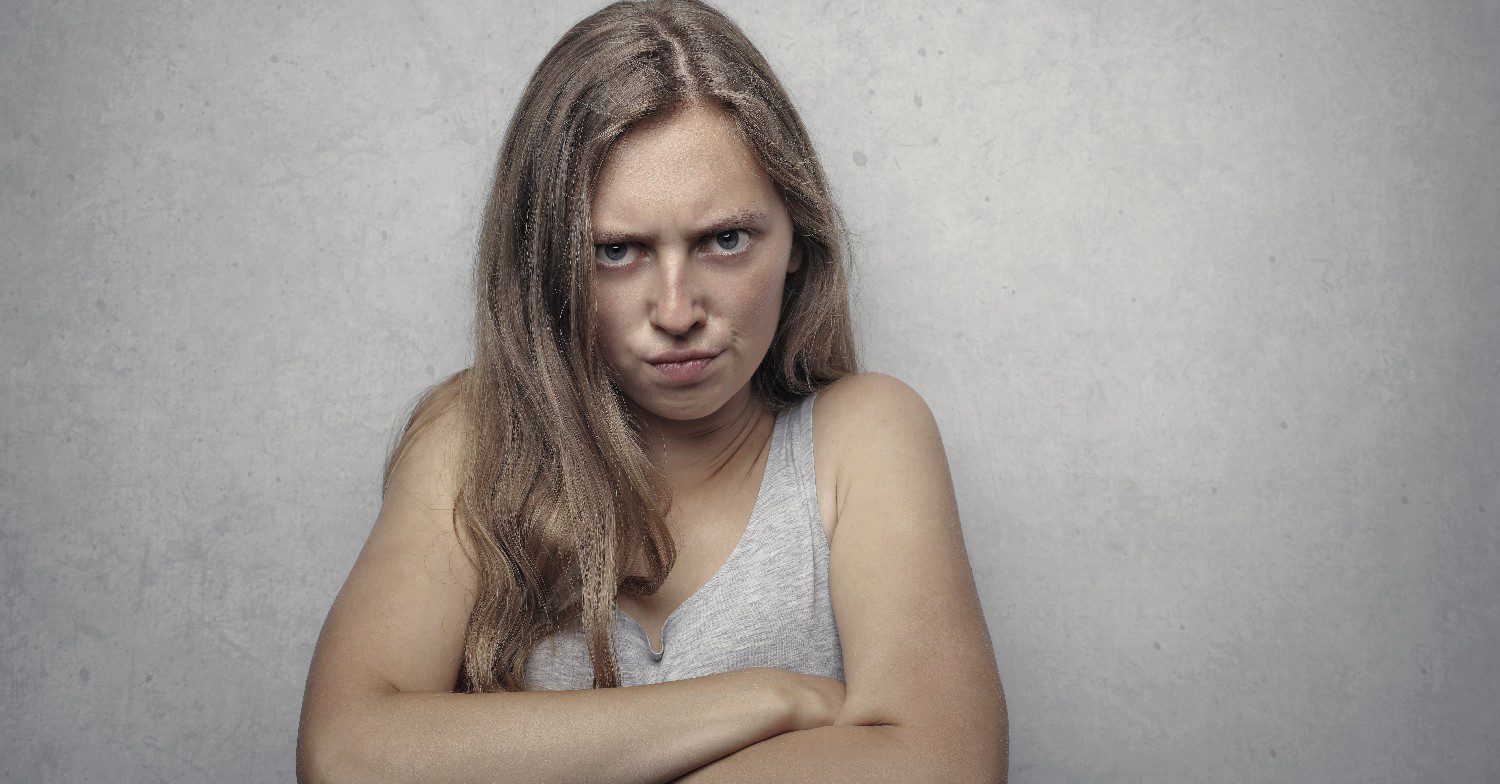 Woman crossing her arms