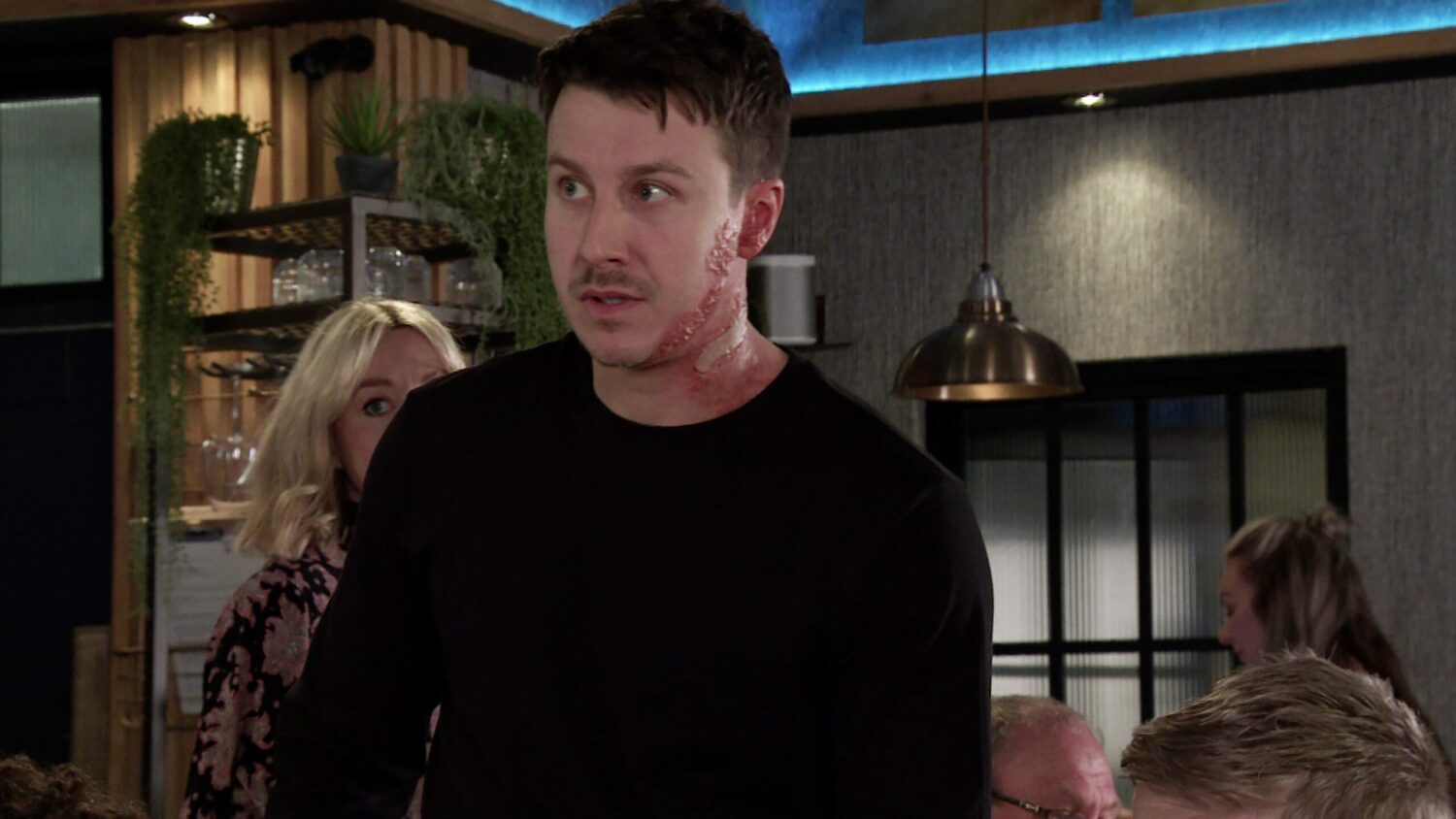 Coronation Street's Ryan looks shocked in the Bistro