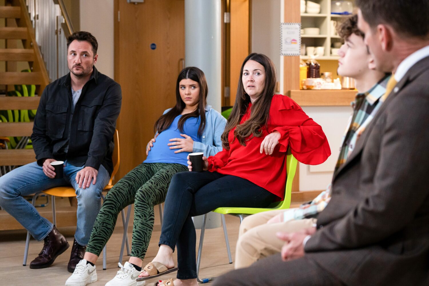 Martin Fowler, Lily Slater, Stacey Slater, Ricky Mitchell and Jack Branning look tense at the family conference
