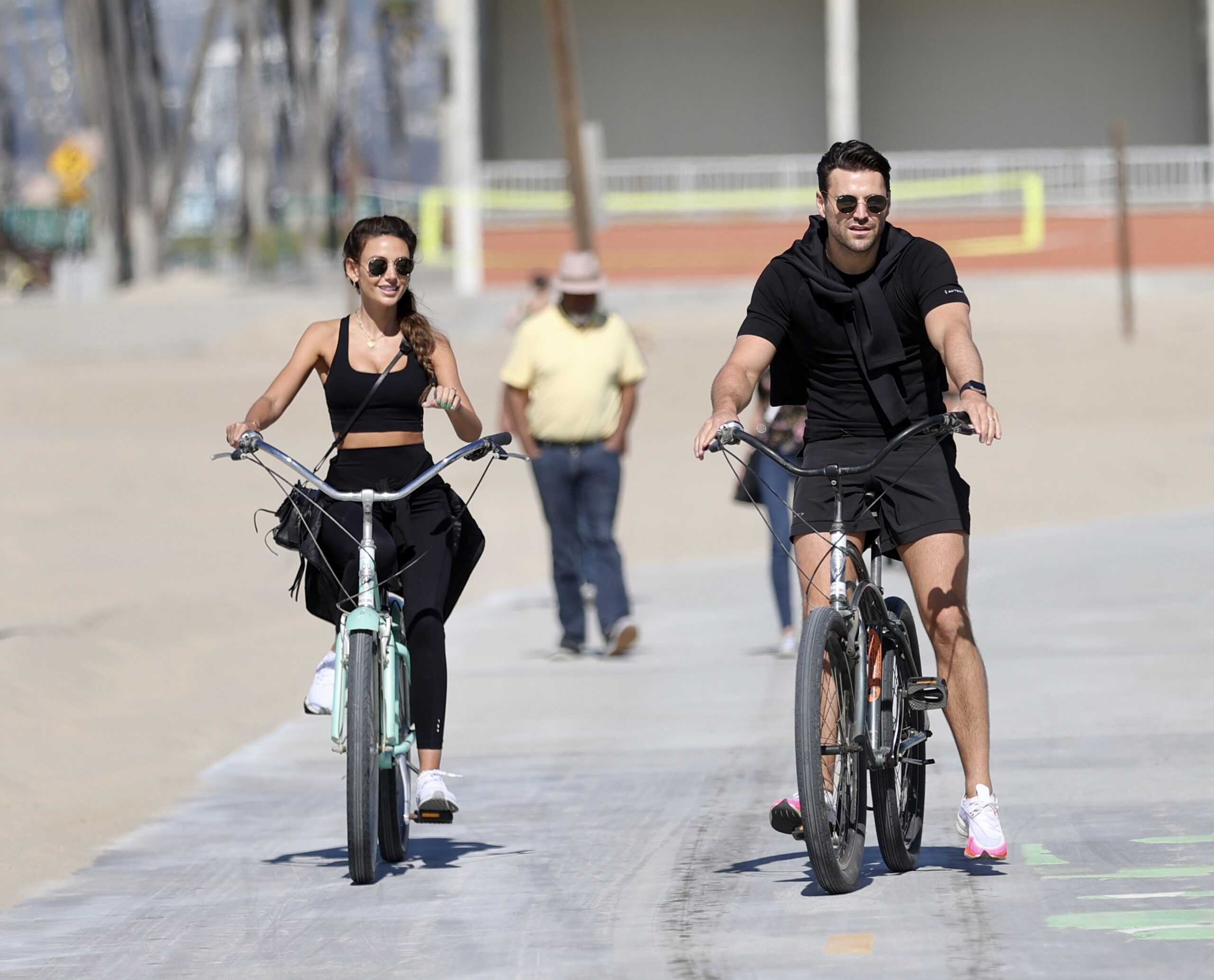 Mark Wright and Michelle Keegan riding their bikes
