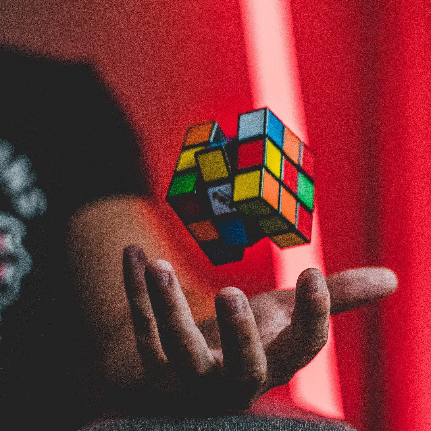 Man playing with a Rubik's Cube