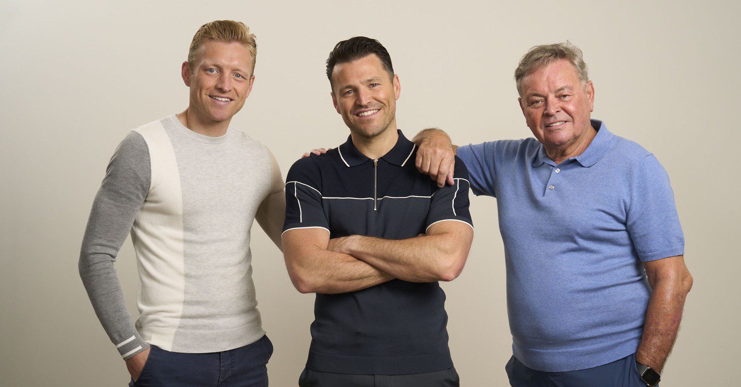 Mark Wright smiles with his dad and brother