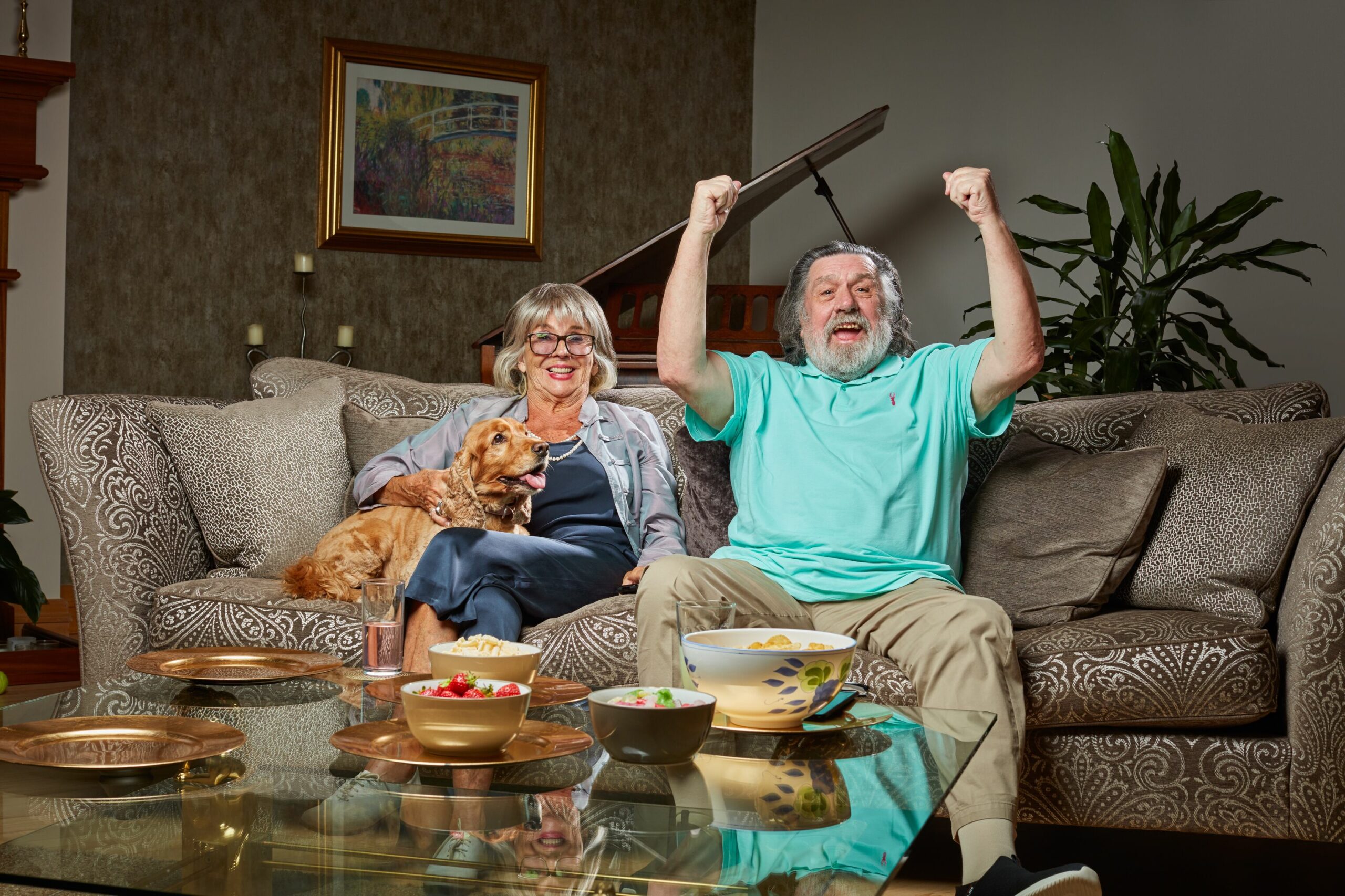 Ricky Tomlinson and Sue Johnston smile on Celebrity Gogglebox