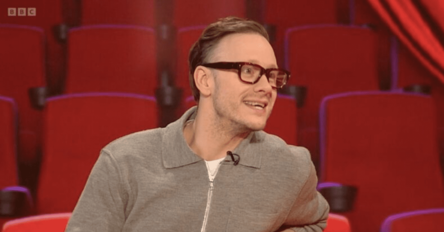 Kevin on a red background