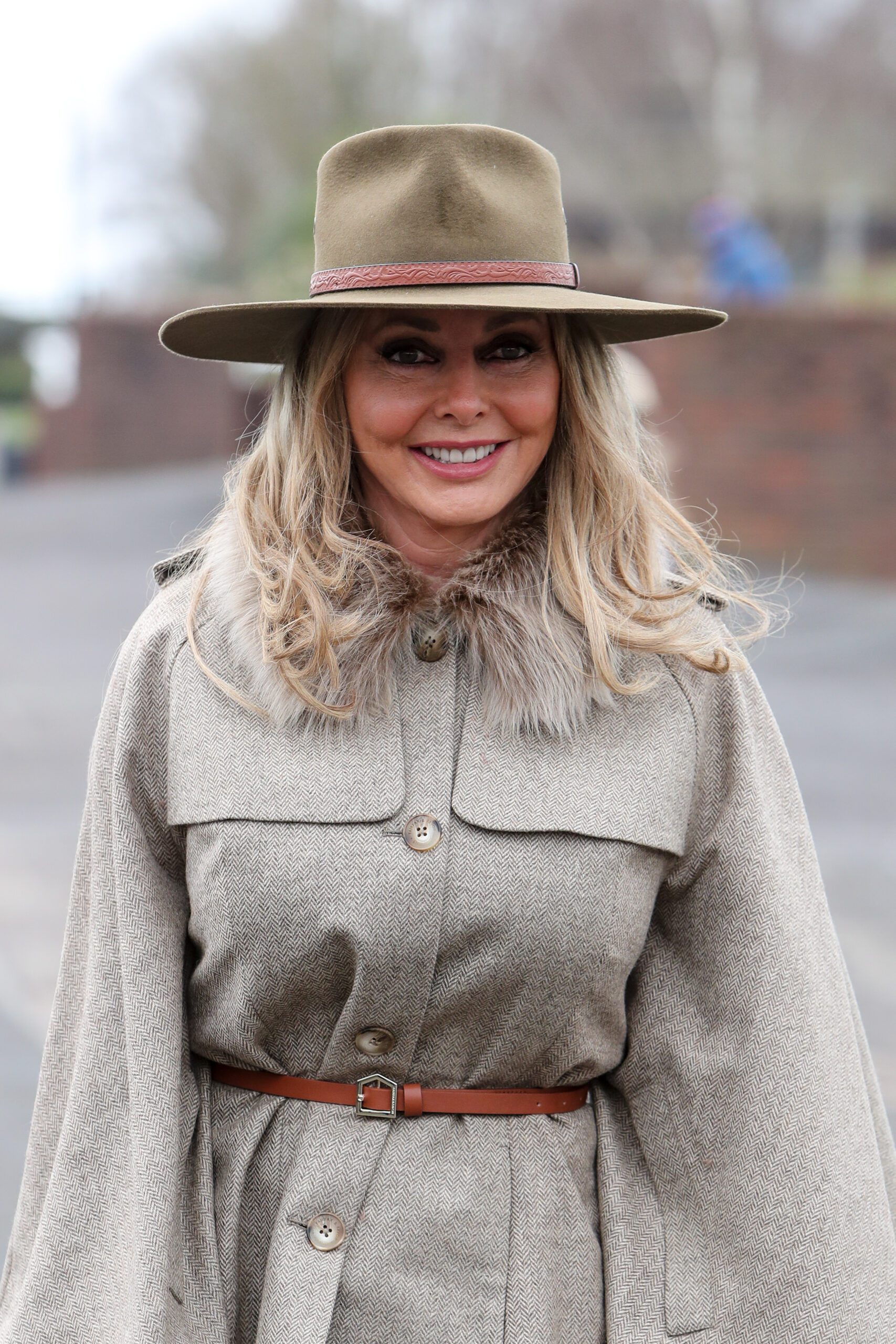 Carol Vorderman wearing a hat and jacket