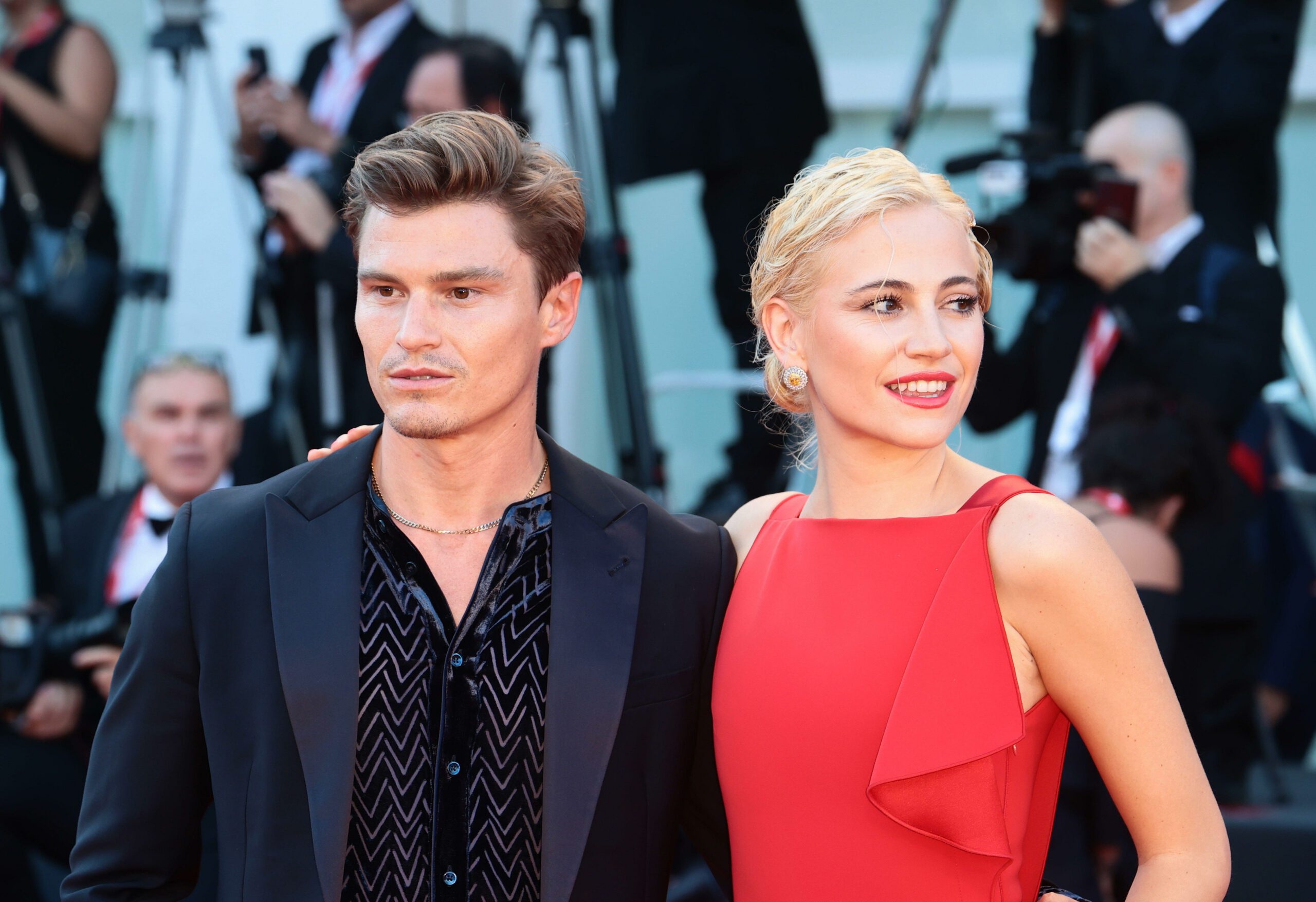 Pixie Lott smiles with husband Oliver Cheshire