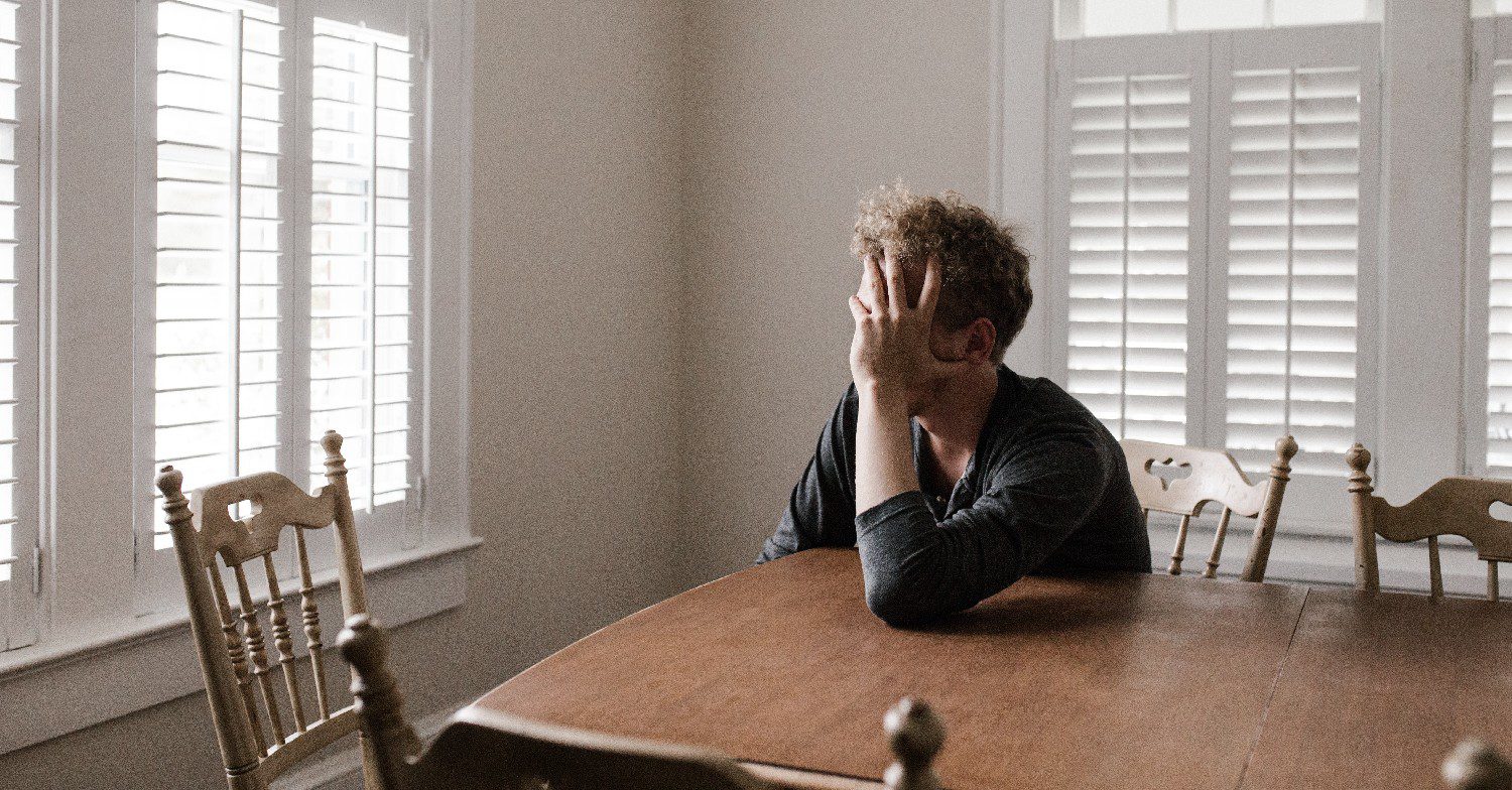 Man looking out of the window