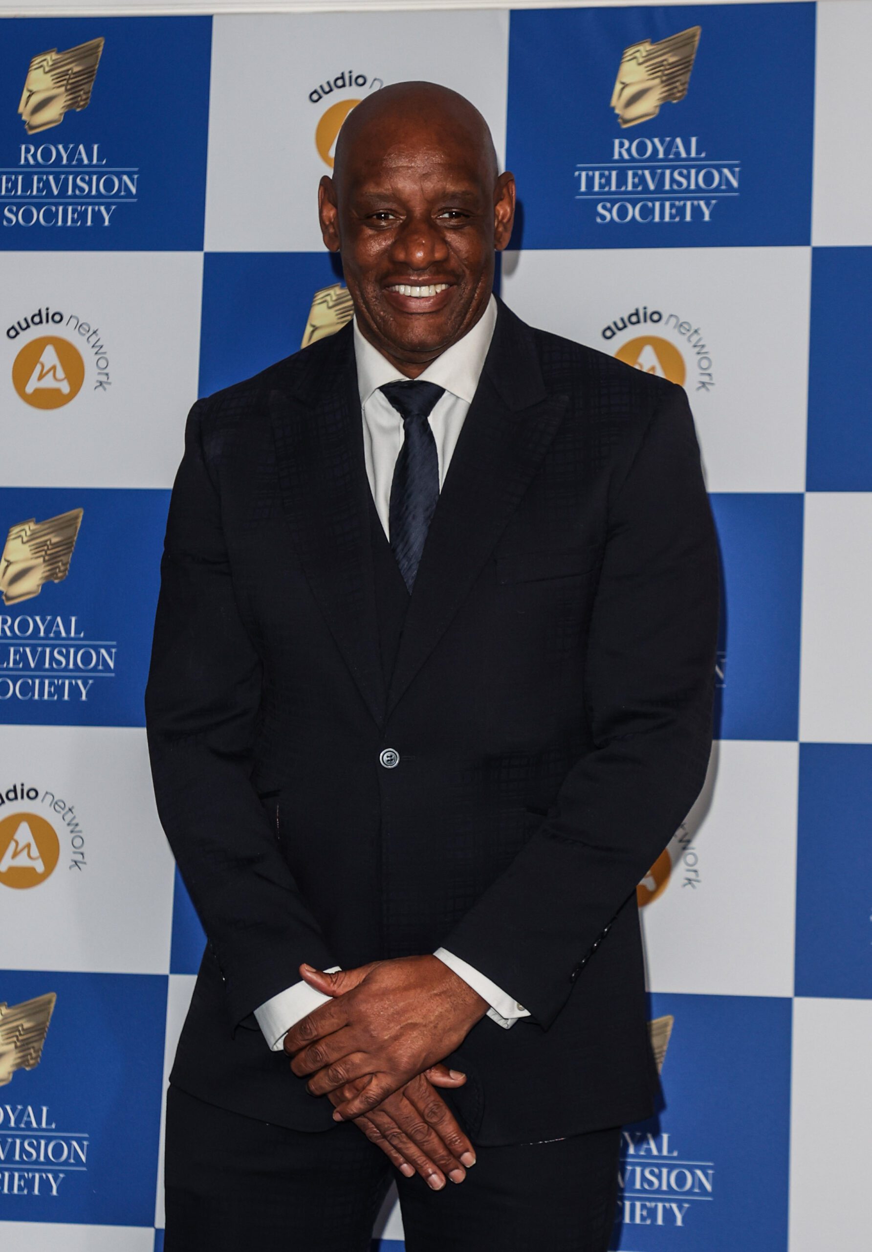 Shaun wearing a suit on the red carpet