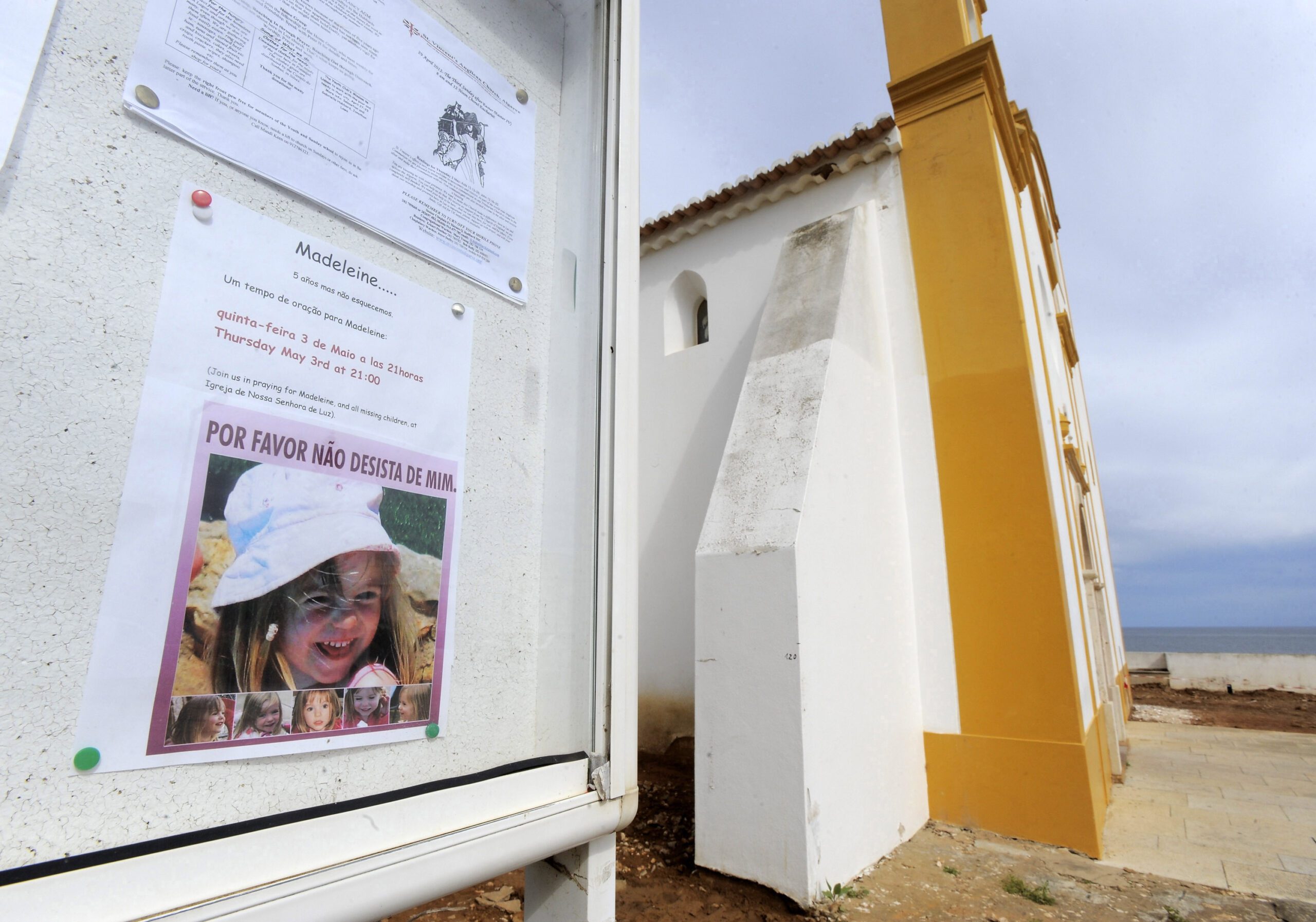 Portugal sign board with a poster of Madeleine McCann