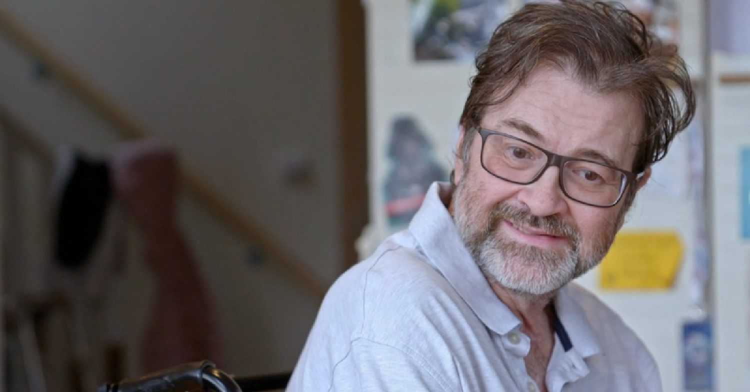 Derek Draper smiling in Caring for Derek documentary