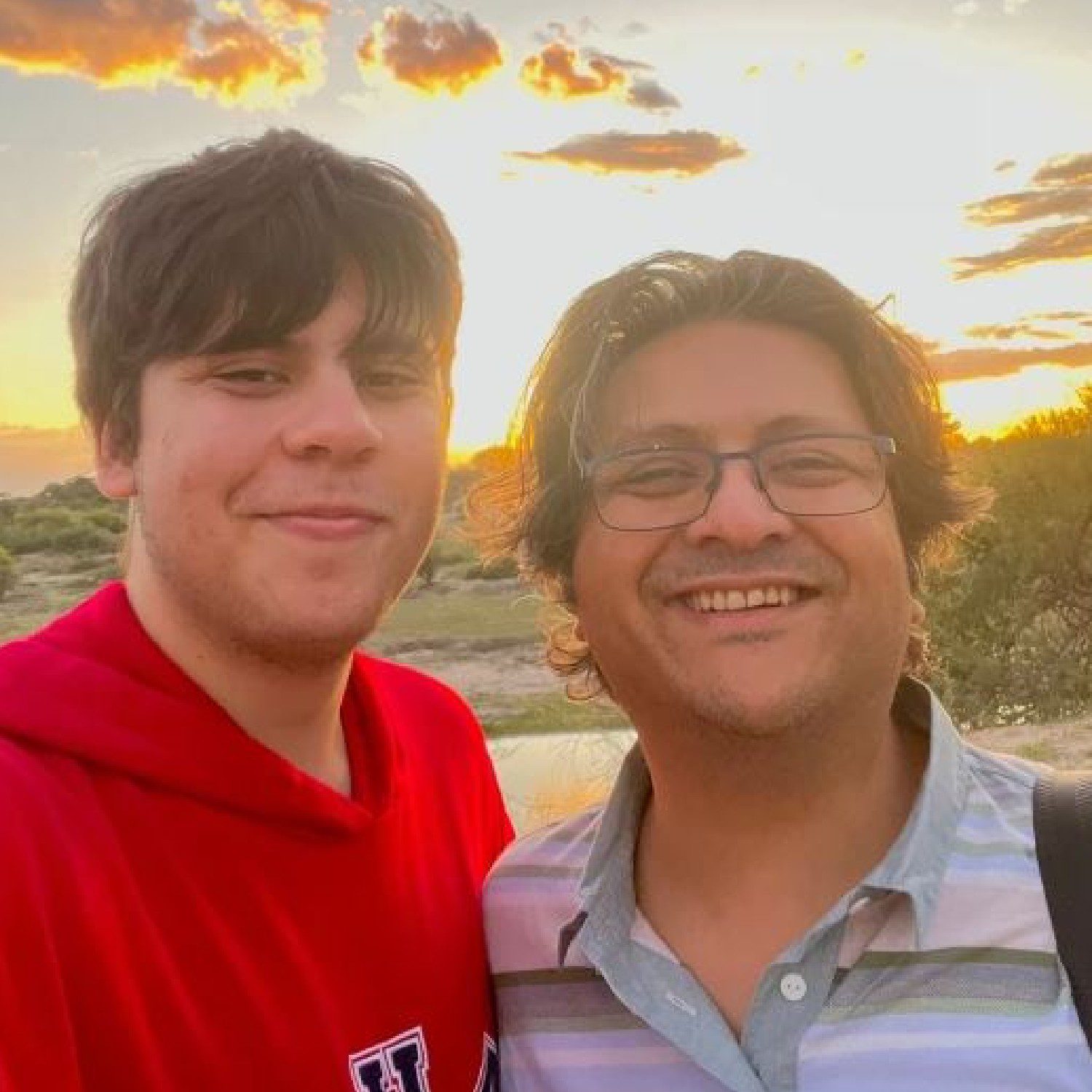 Suleman and Shahzada Dawood smiling in picture