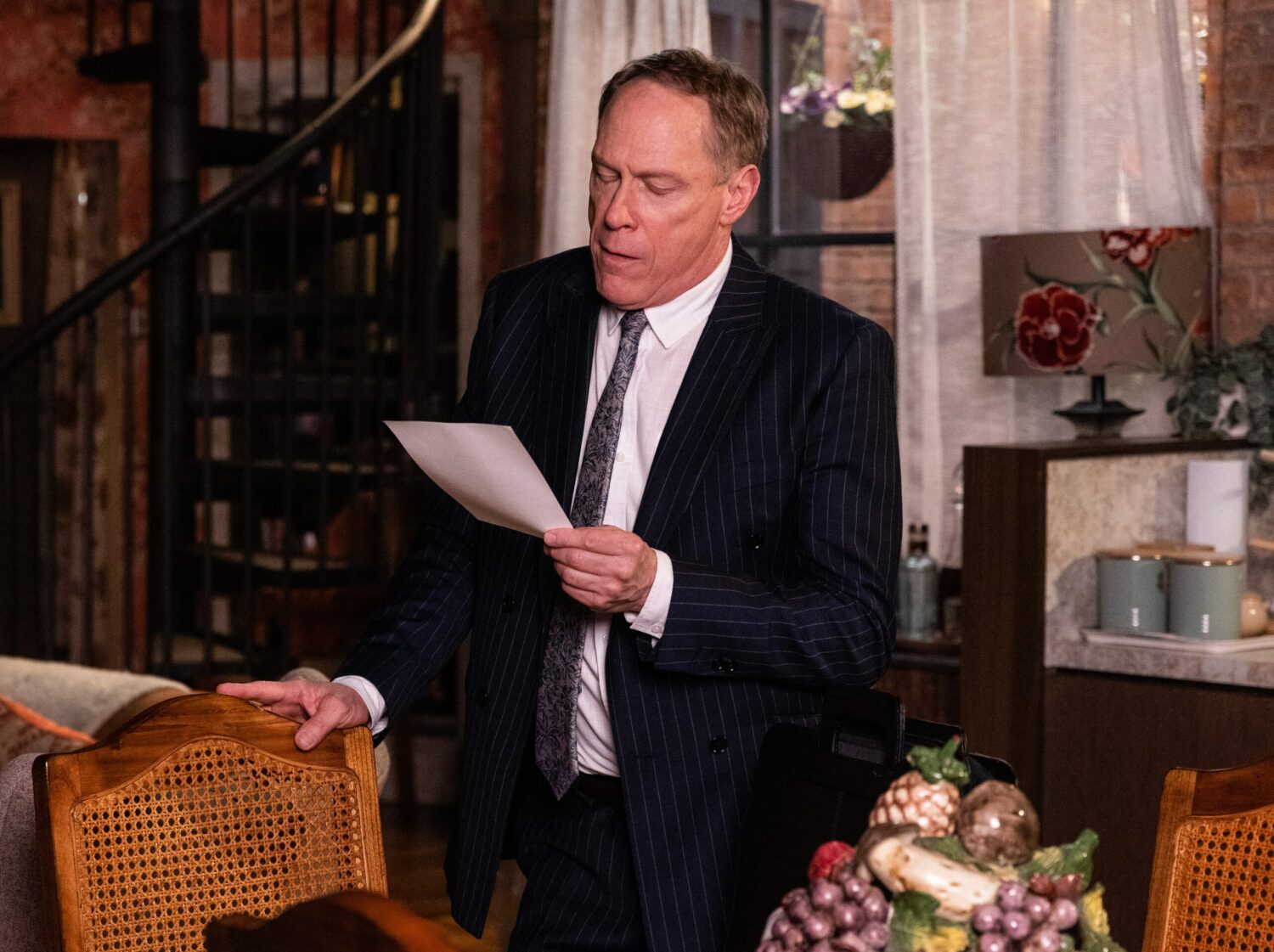 Stephen in Corrie looks at an important document very carefully