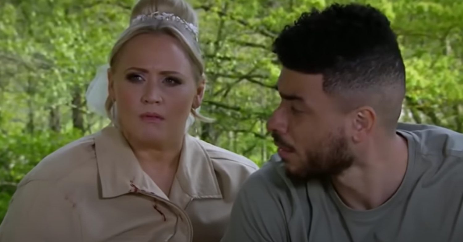 Emmerdale's Tracy and Nate are looking concerned outside