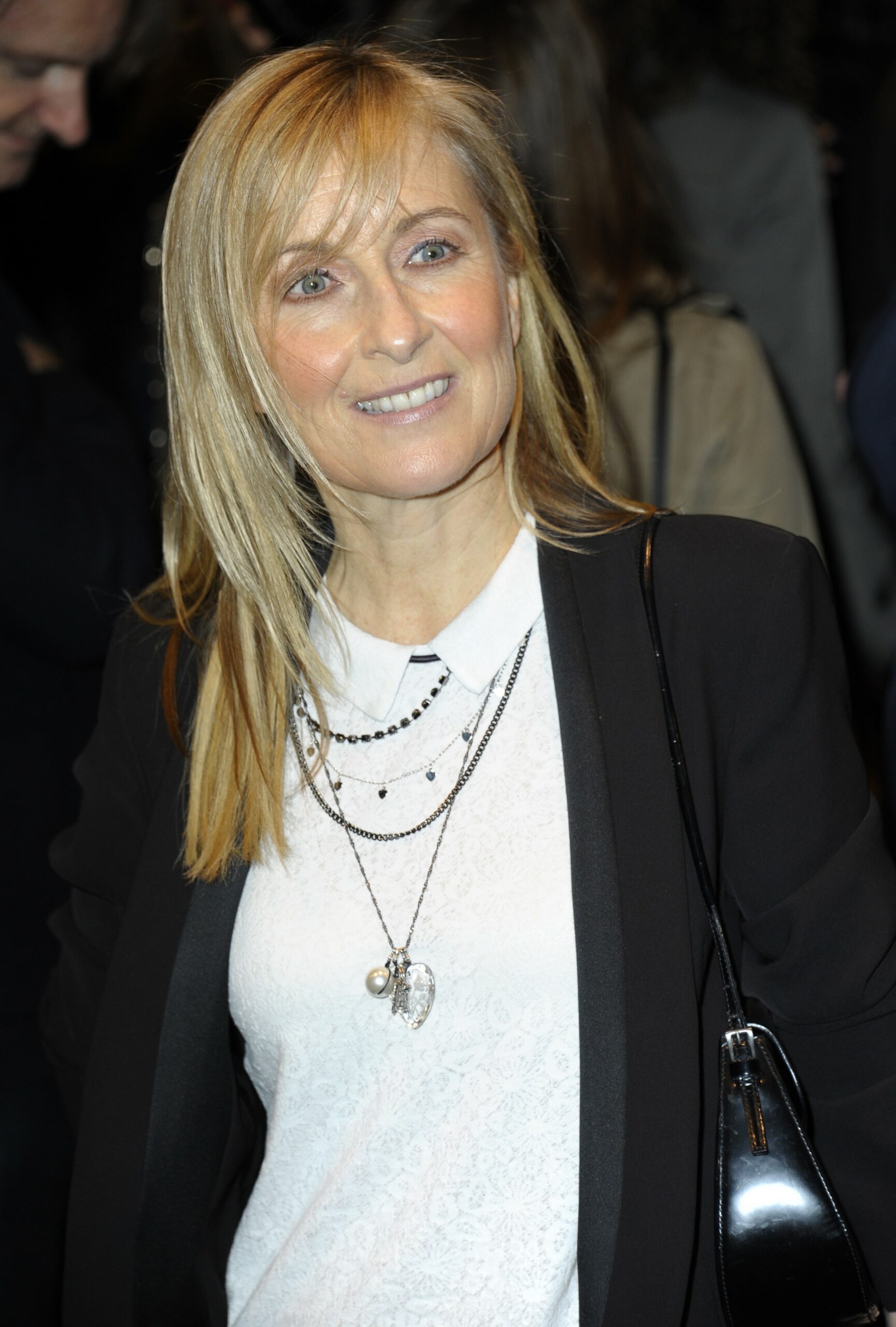 Fiona Phillips smiling at event in 2014