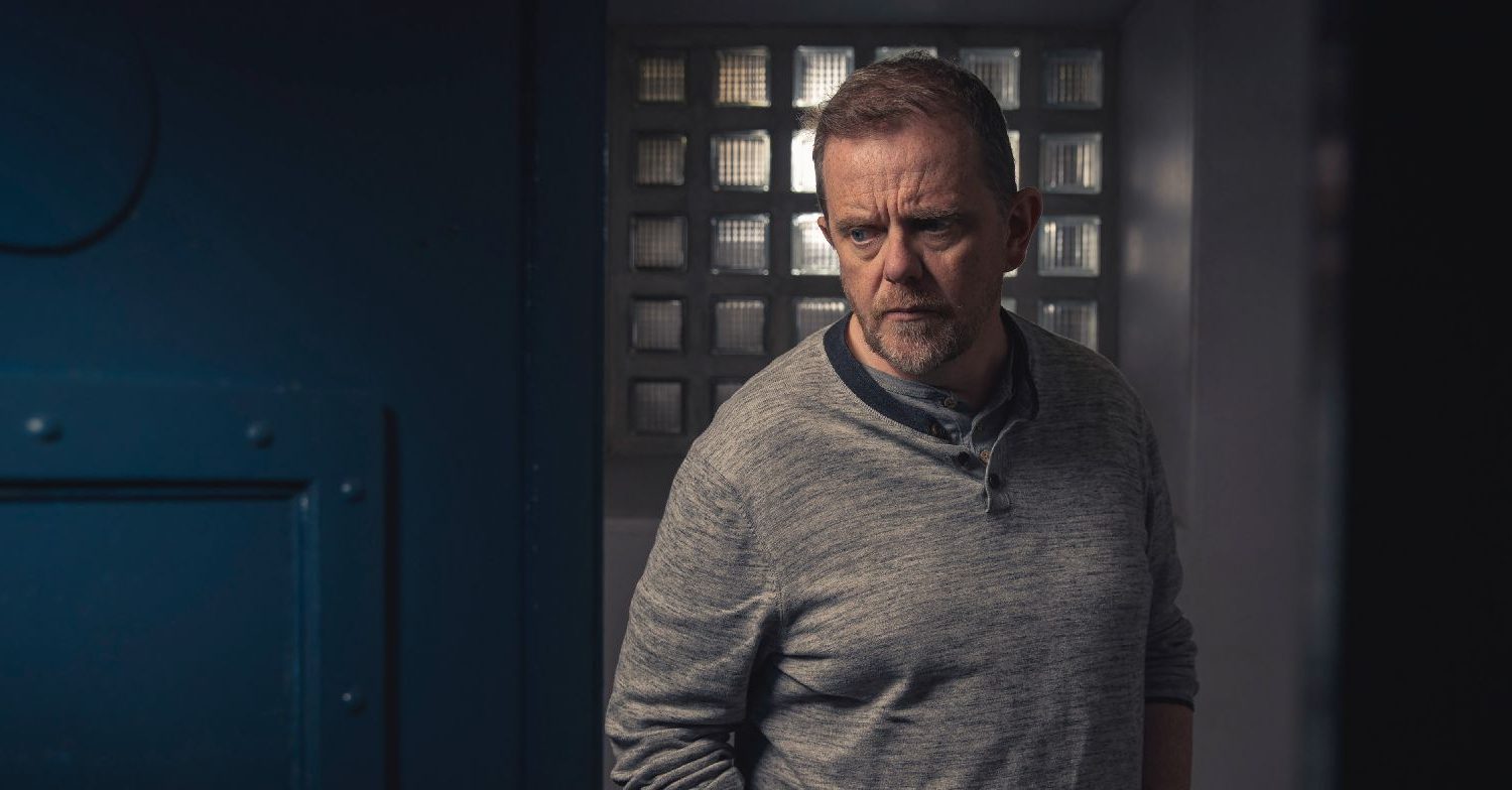 Emmerdale's Dan is standing in a cell