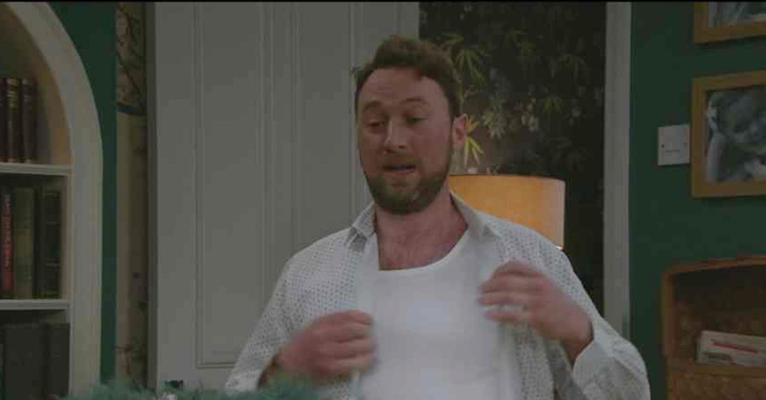 Emmerdale's Liam is putting his shirt back on