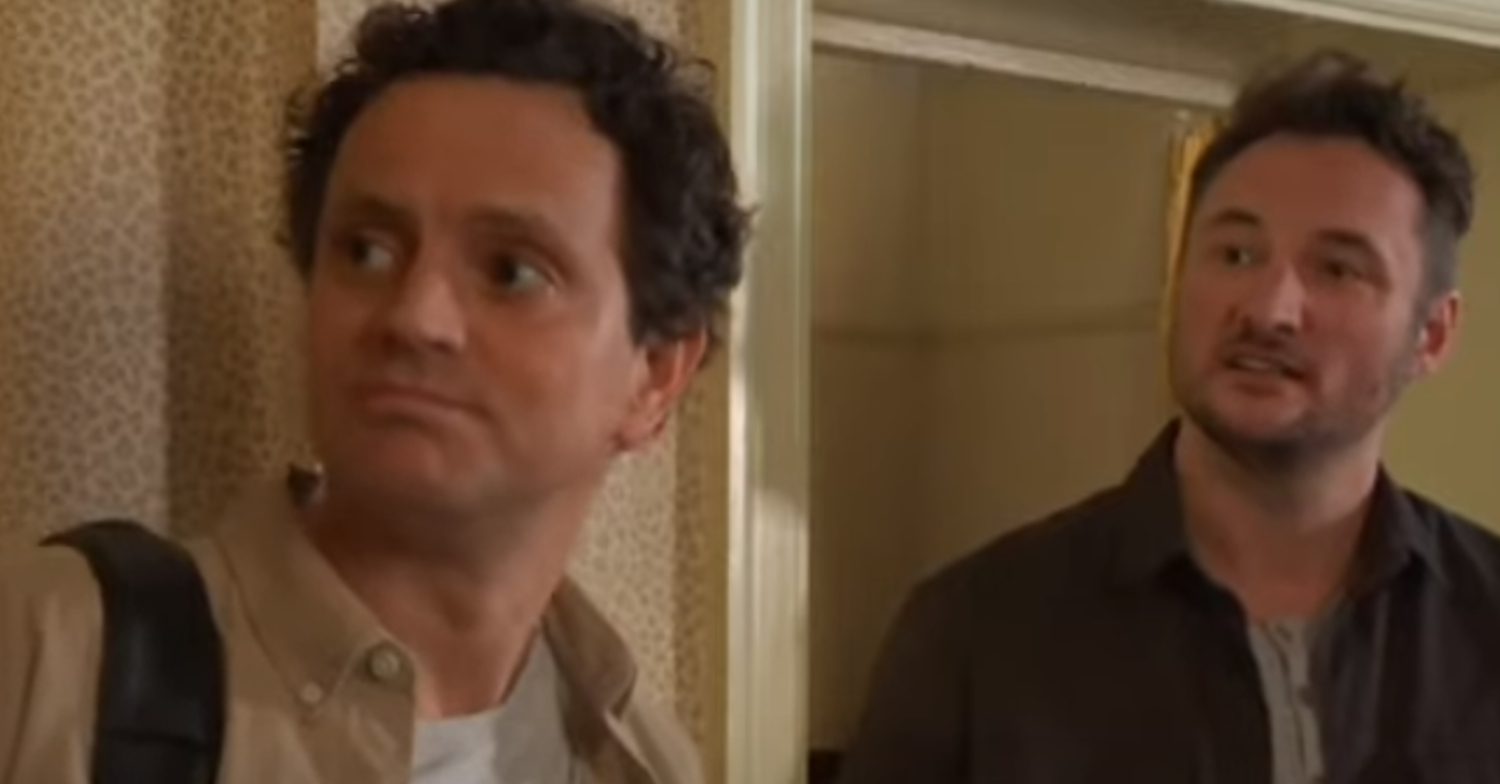 EastEnders' Theo and Martin are standing next to each other in the Slater house