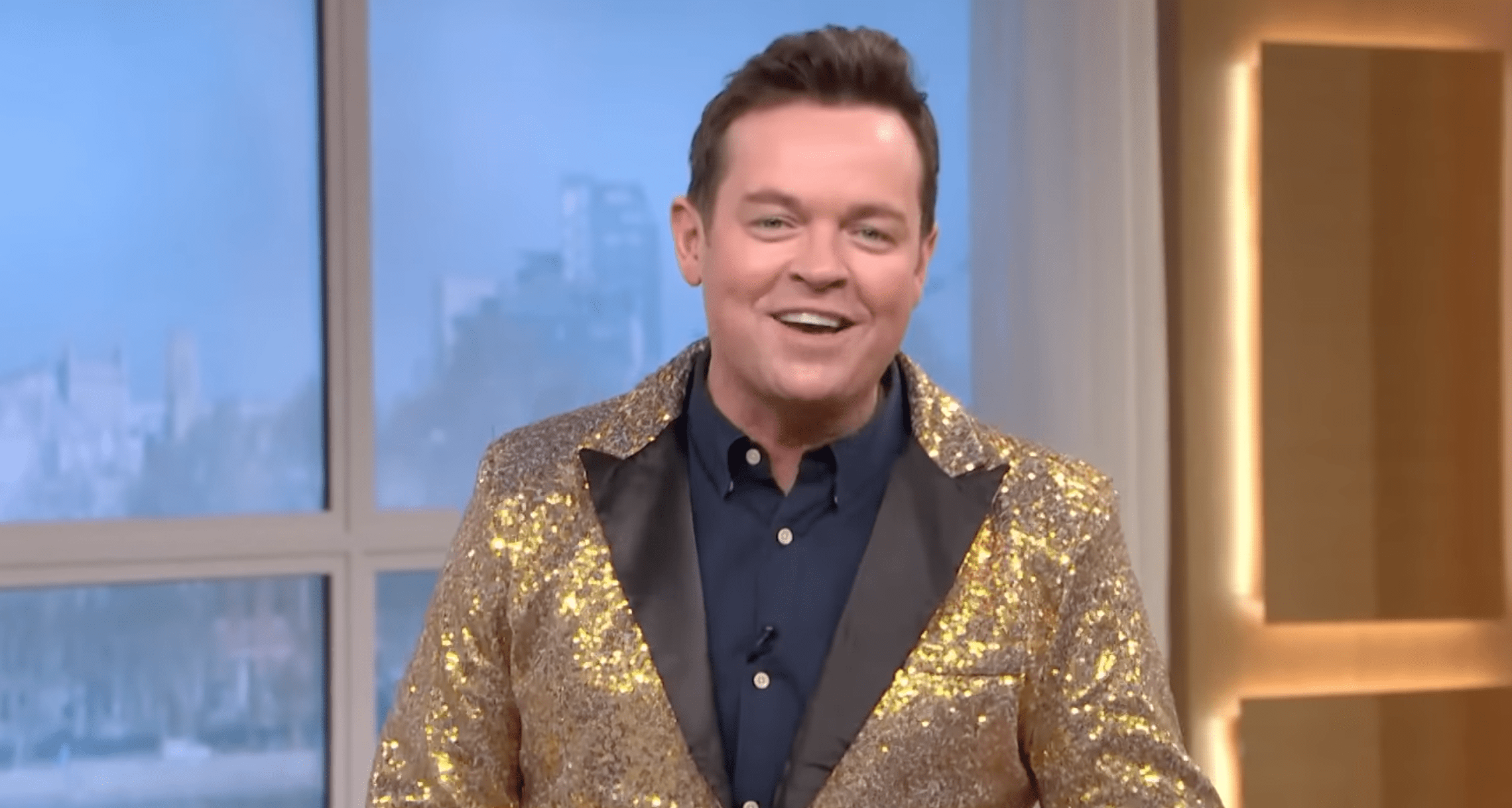 Stephen Mulhern in a gold sequinned jacket