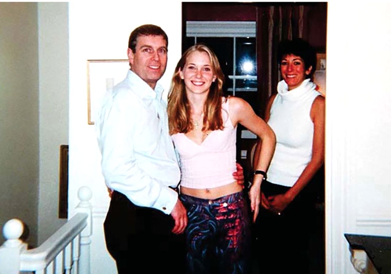 Prince Andrew with Virginia Roberts, and Ghislaine Maxwell on right