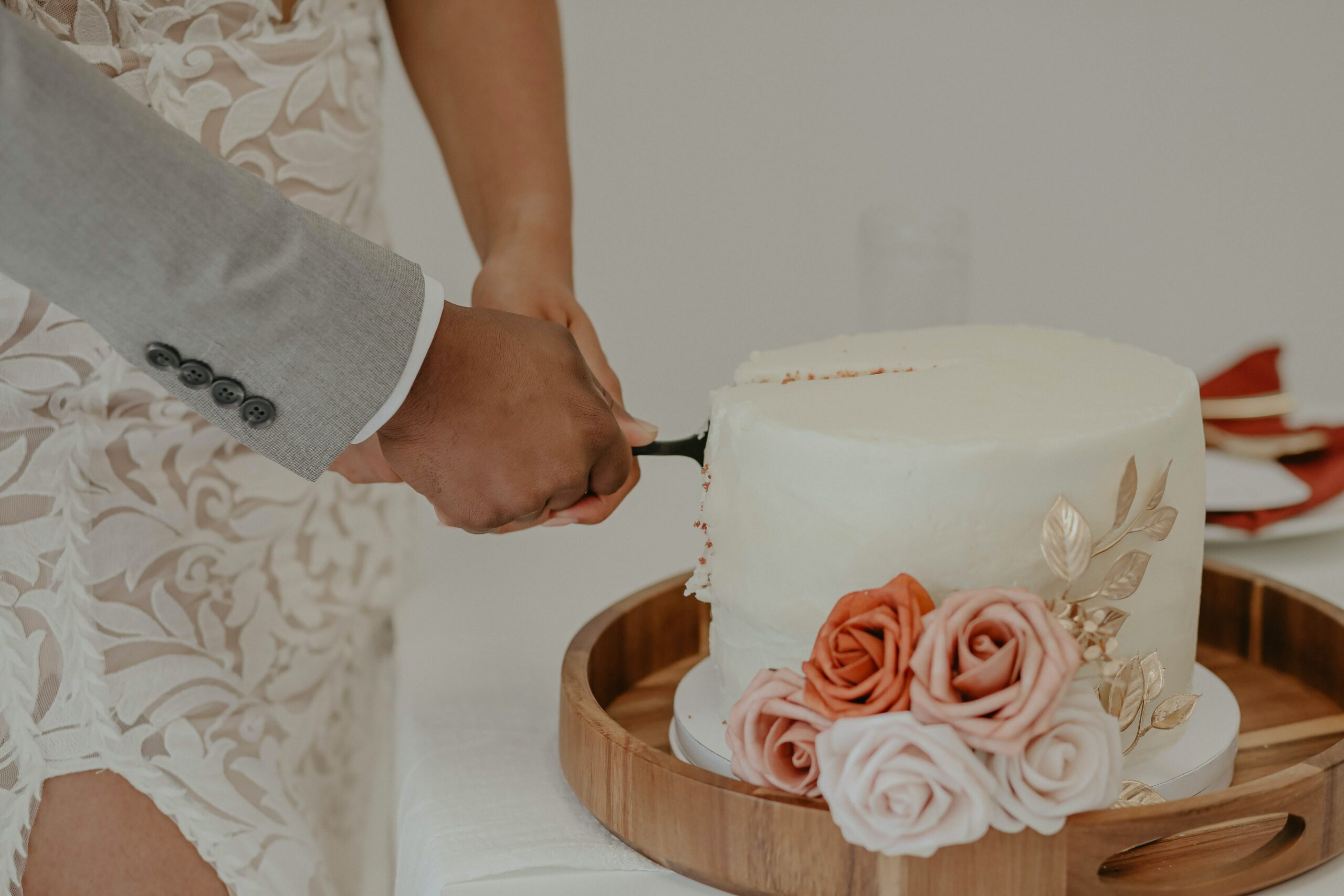 Couple cutting a wedding cake
